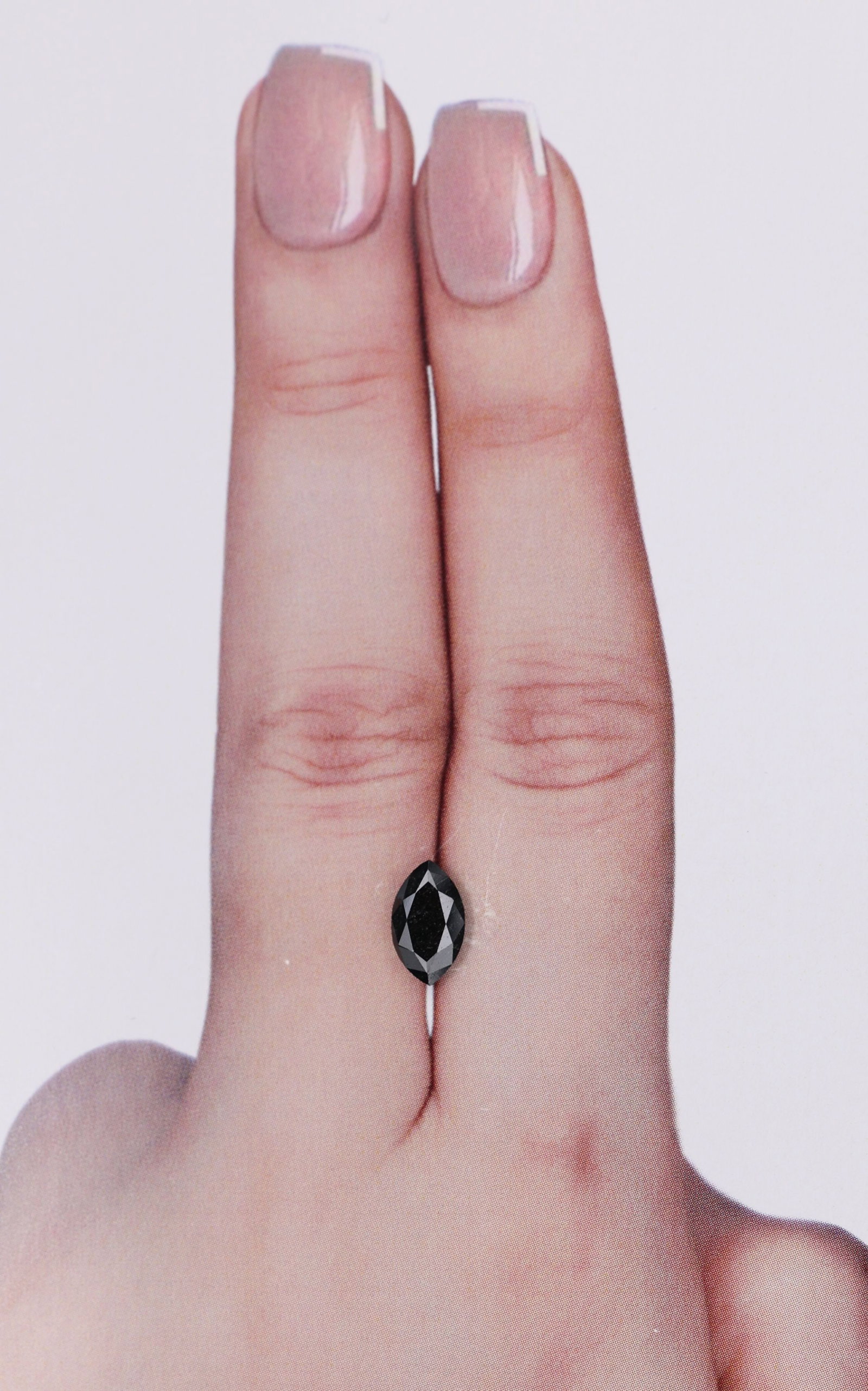 Marquise 0.83ct Fancy Black VVS2 - Loose Natural Diamond: Marquise 0.83ct Fancy Black VVS2 - Loose Natural Diamond 0.83ct Fancy Black VVS2 - Loose Natural DiamondThe Marquise cut diamond boasts an exceptionally rare Fancy Black color, a hallmark of the