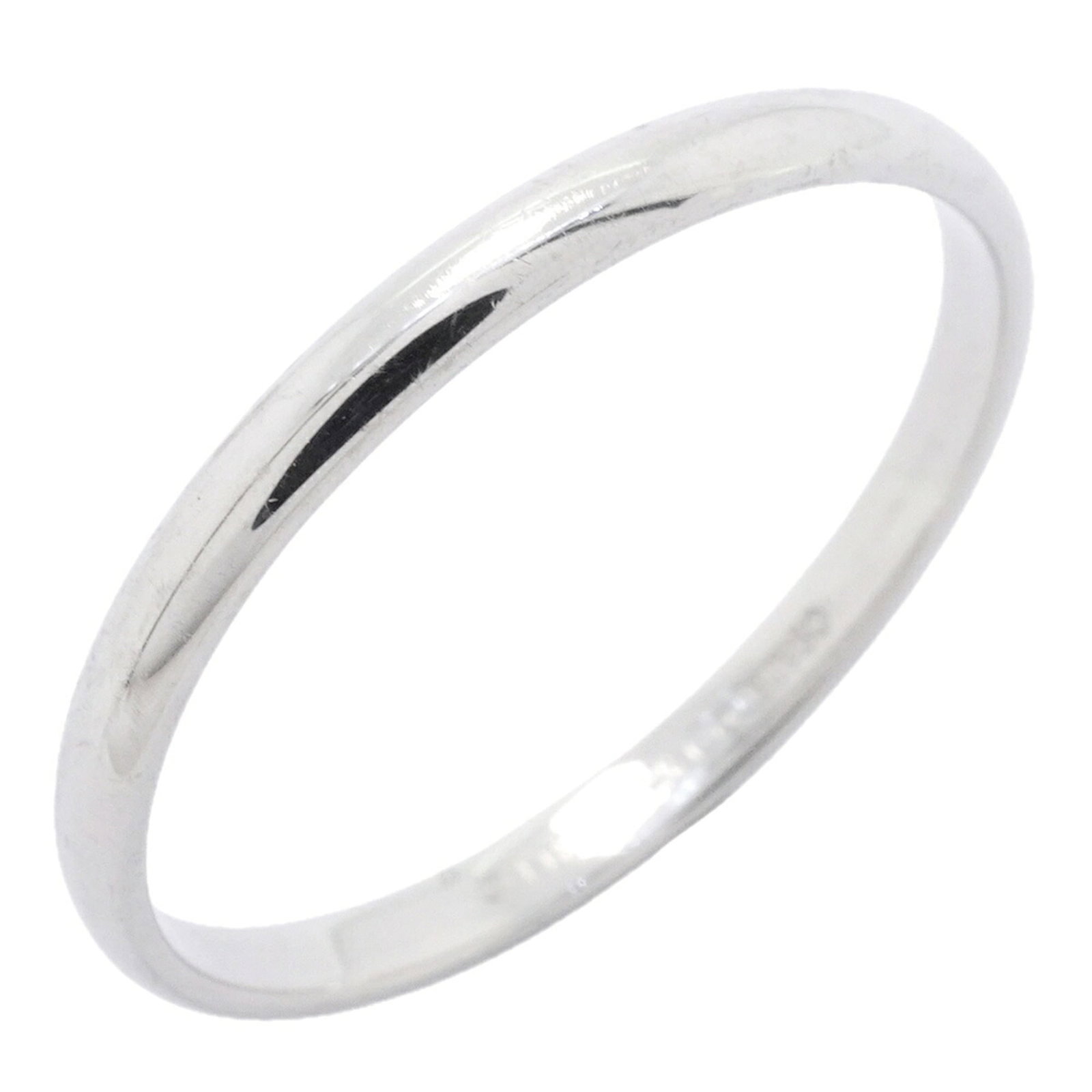 TIFFANY Band Ring Platinum 950: TIFFANY Band Ring Platinum 950 Platinum 950 construction and Tiffany branding make this band ring a distinctive accessory. The item features visible wear, including scratches and scuffs, and is in goo
