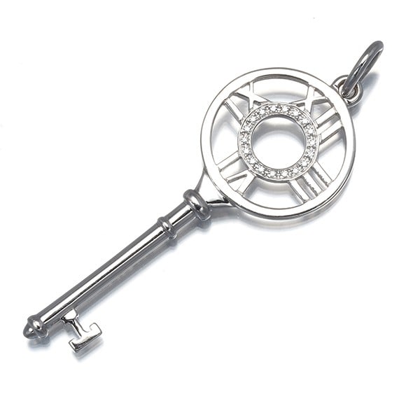 Tiffany&Co. Pendant Diamond Atlas Key Charm 18K 750 White Gold: Tiffany&Co. Pendant Diamond Atlas Key Charm 18K 750 White Gold Tiffany & Co.'s 18k white gold Atlas Key Charm pendant boasts a natural diamond main stone, set in a sleek key-shaped design that adds a 