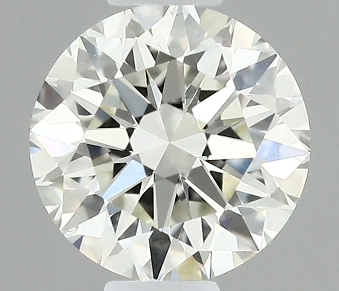 IGI Round 0.34ct I VVS2 - Loose Natural Diamond: IGI Round 0.34ct I VVS2 - Loose Natural Diamond 0.34ct I VVS2 - Loose Natural DiamondThis IGI certified diamond boasts exceptional clarity, with a VVS2 grade indicating minimal inclusions. Its EX