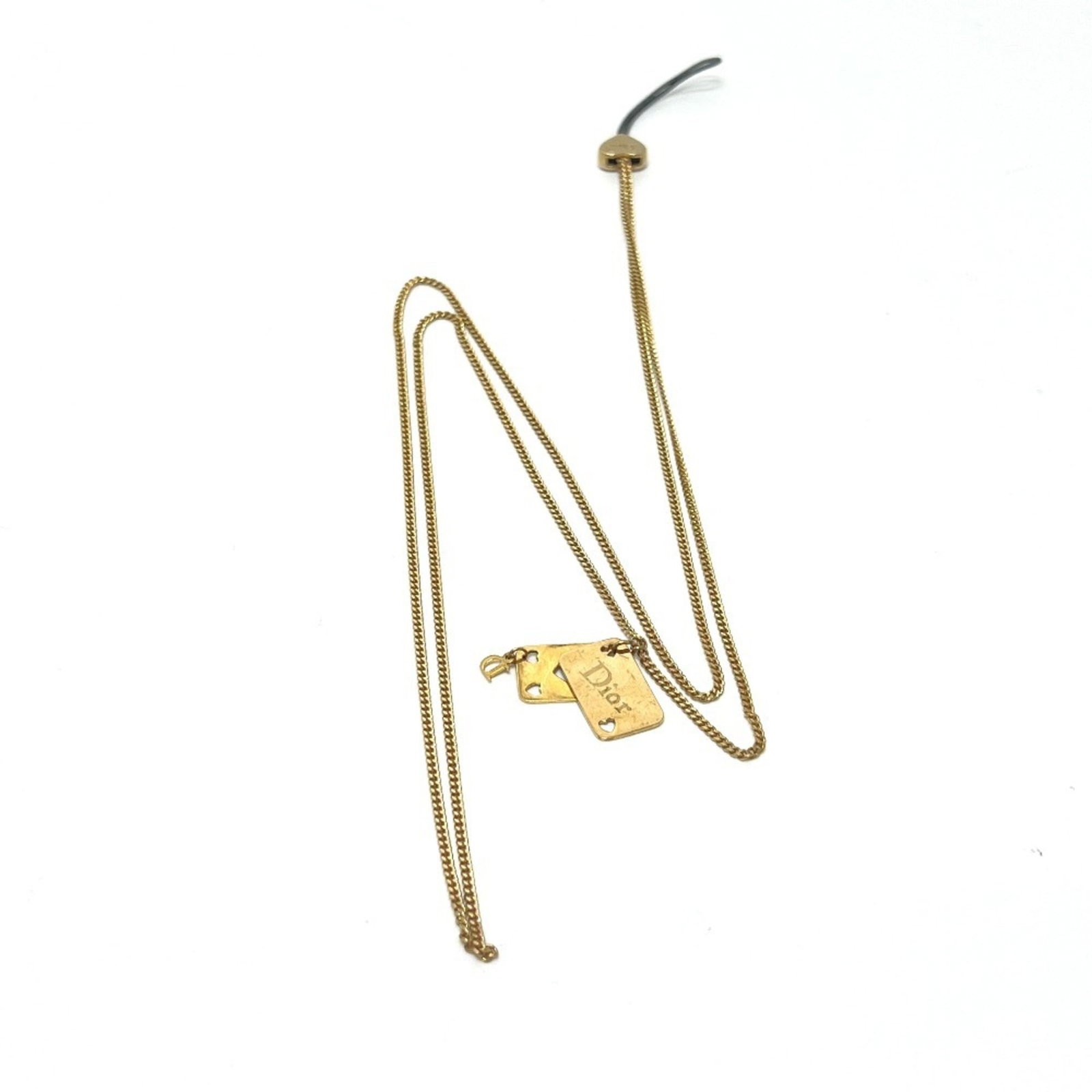 CHRISTIAN DIOR Metal: CHRISTIAN DIOR Metal Gold Christian Dior Metal Necklace, 55 cm circumference, bearing a signature. This necklace is a gold metal piece from Christian Dior, featuring a signature. It is used and shows 