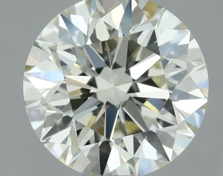 IGI Round 0.73ct M VVS2 - Loose Natural Diamond: IGI Round 0.73ct M VVS2 - Loose Natural Diamond 0.73ct M VVS2 - A Natural Diamond of Exceptional Clarity and Cut. This IGI-certified, EX-cut diamond boasts an impressive EX polish and symmetry,
