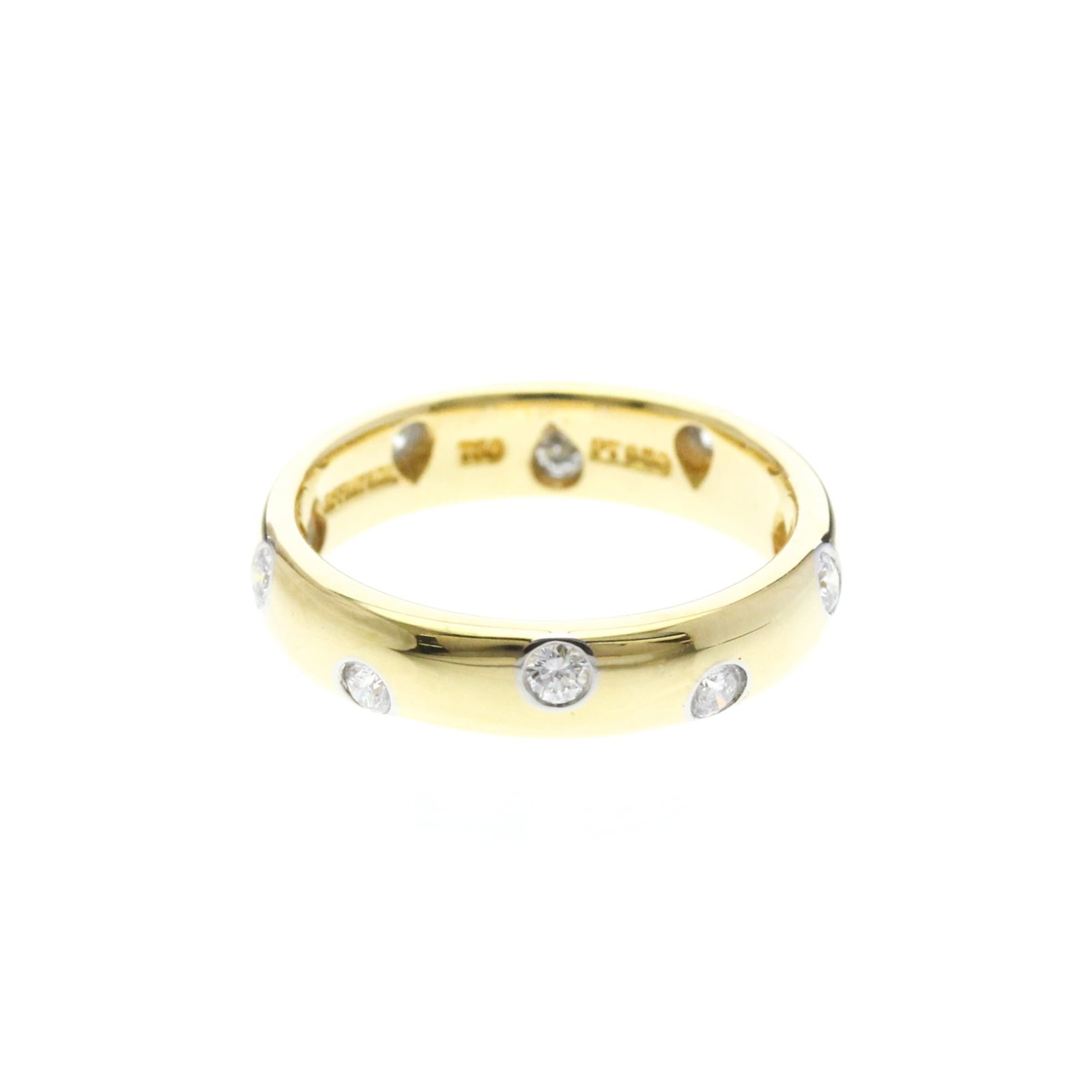 TIFFANY Band Ring Platinum Yellow Gold (18K): TIFFANY Band Ring Platinum Yellow Gold (18K) Platinum and 18K yellow gold come together in this elegant band ring from Tiffany, featuring a subtle diamond accent that adds a touch of sophistication. T