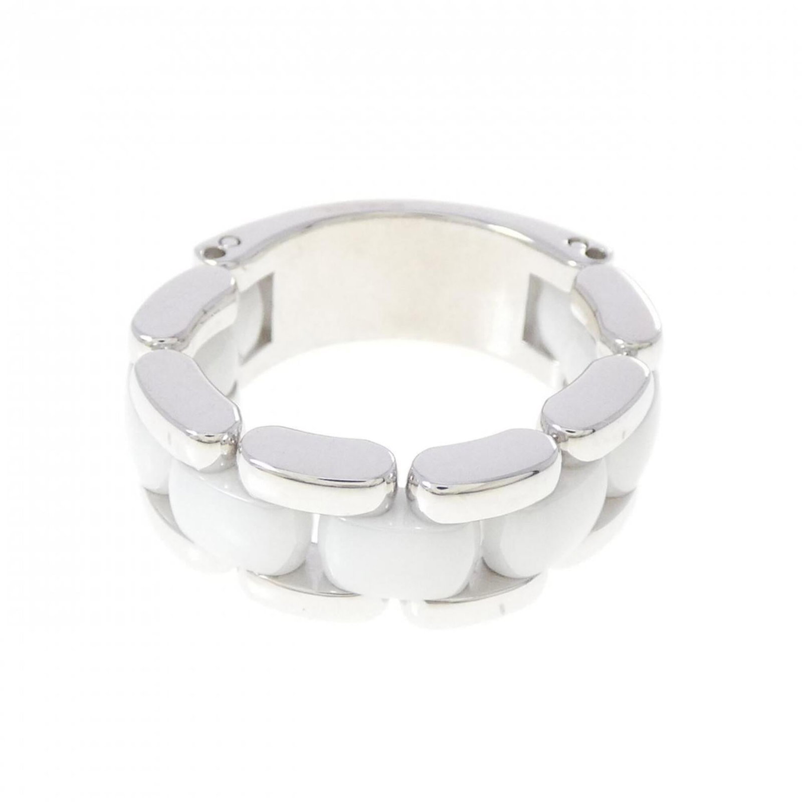 CHANEL Band Ring Ceramic White Gold (18K): CHANEL Band Ring Ceramic White Gold (18K) Ceramic and 18K white gold come together in this elegant band ring from CHANEL, a classic design that exudes timeless sophistication. With its gentle wear