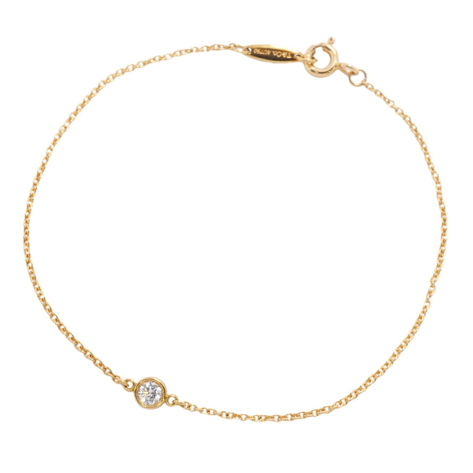 TIFFANY Charm Bracelet Yellow Gold (18K): TIFFANY Charm Bracelet Yellow Gold (18K) Yellow gold (18K) Tiffany charm bracelet with a diamond stone, this 17cm / 6.69'' charm bracelet is a classic piece of jewelry with visible wear and