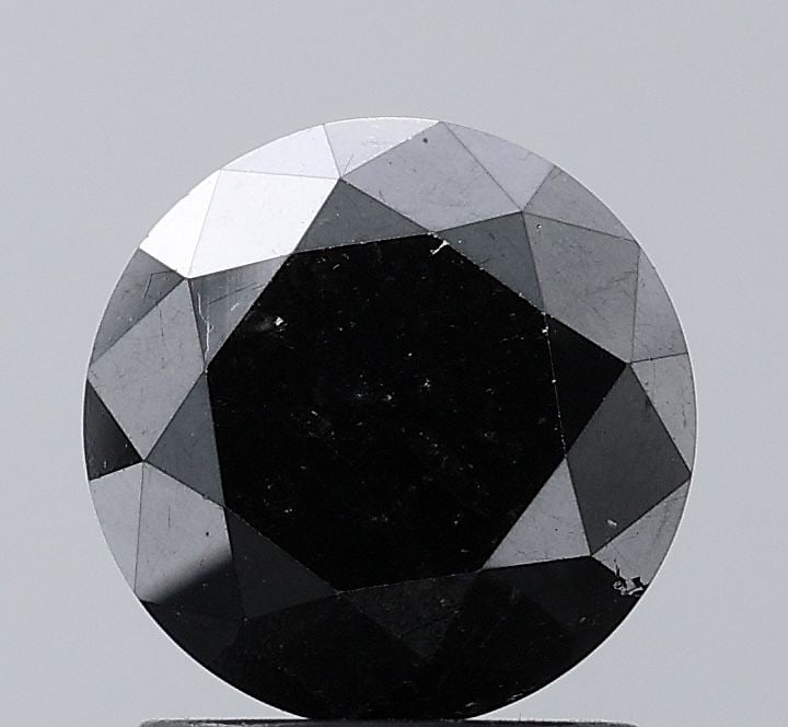 Round 1.84ct Black VVS2 - Loose Natural Diamond: Round 1.84ct Black VVS2 - Loose Natural Diamond Round 1.84ct Black VVS2 - Loose Natural Diamond, featuring exceptional clarity and polish, showcases a rare and mysterious black diamond with EX cut