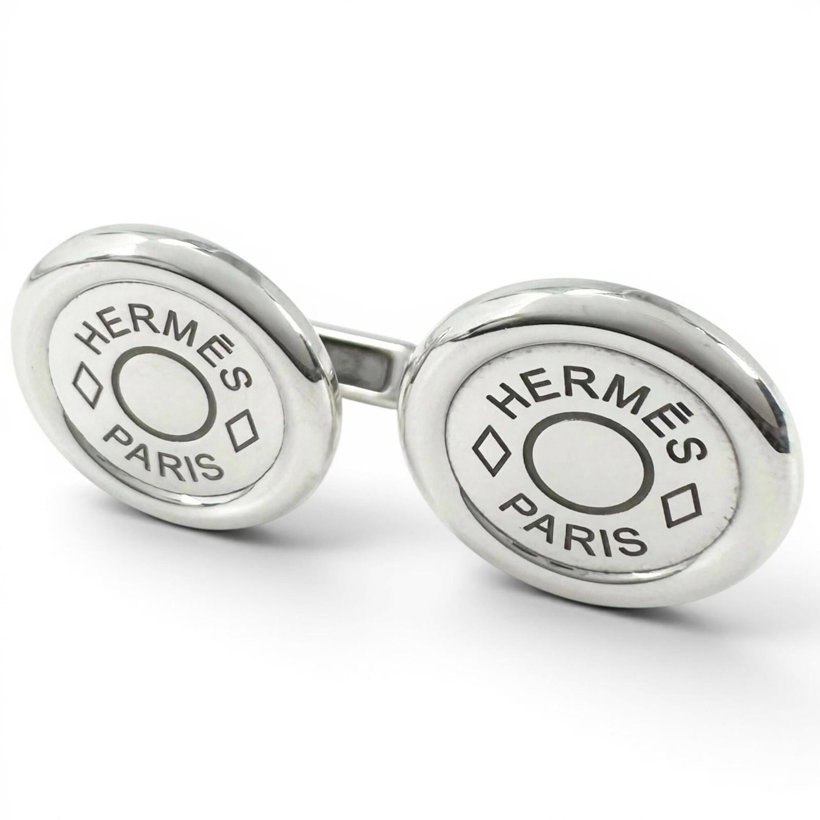 HERMES Cufflinks Silver 925: HERMES Cufflinks Silver 925 Silver 925 Hermes Cufflinks - Gently Used, Minor Signs of Wear. These elegant cufflinks are crafted from high-quality silver, measuring 16.00mm in diameter. With a subtle s
