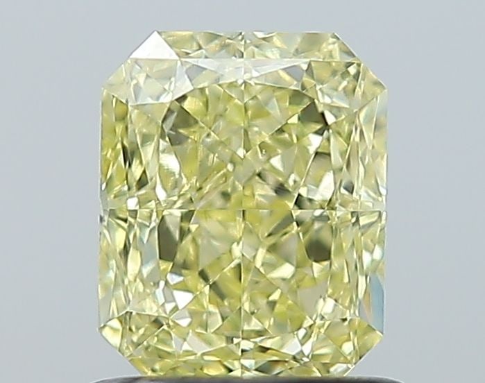 GIA Radiant 1.01ct Fancy Yellow VVS2 - Loose Natural Diamond: GIA Radiant 1.01ct Fancy Yellow VVS2 - Loose Natural Diamond GIA-certified, this 1.01ct Fancy Yellow VVS2 diamond boasts exceptional clarity and color, making it a standout among loose natural