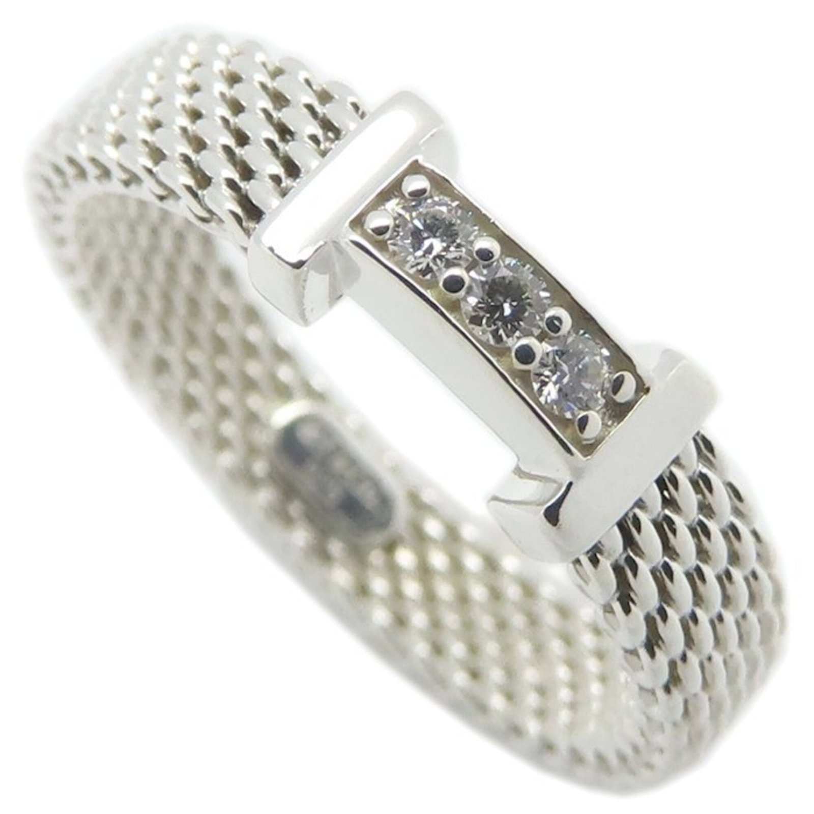 TIFFANY Band Ring Silver 925: TIFFANY Band Ring Silver 925 Silver 925 band ring from Tiffany featuring a diamond stone, available in US size 4.5. Gently used with minor signs of wear, this ring is in very good condition. Weighing