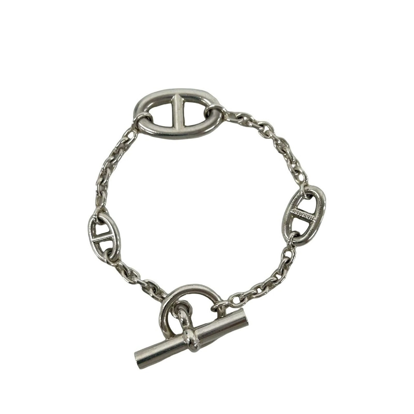 HERMES Charm Bracelet Silver 925: HERMES Charm Bracelet Silver 925 Silver 925 Charm Bracelet from Hermes Features a classic charm design, measuring 15.5cm in length, with visible signs of wear and minor scratches. The item is made fro