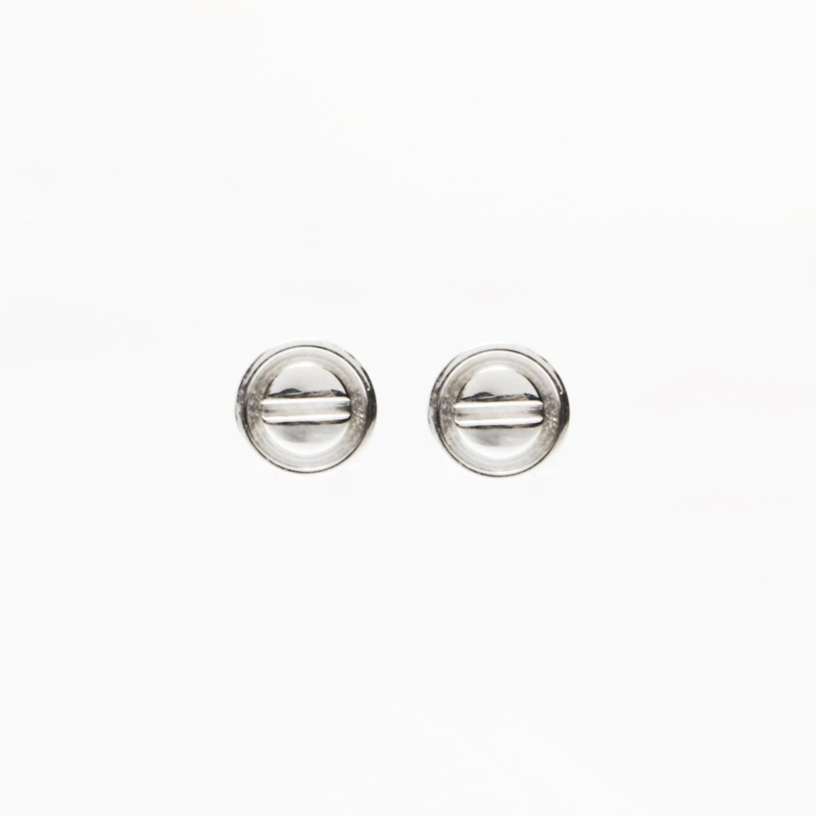CARTIER Stud Earrings White Gold (18K): CARTIER Stud Earrings White Gold (18K) Cartier's iconic stud earrings in white gold (18K) offer a sleek, sophisticated touch to any outfit. With a subtle silver hue and precise 17mm x 17mm