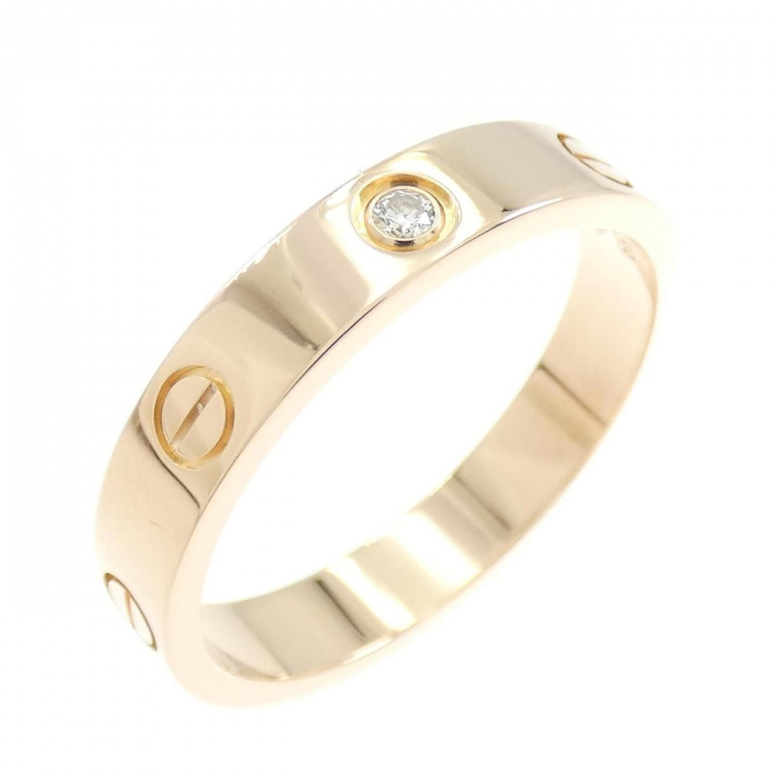 CARTIER Band Ring Pink Gold (18K): CARTIER Band Ring Pink Gold (18K) Pink gold band ring from Cartier, featuring a diamond stone and 18K pink gold construction. This gently used ring showcases minor signs of wear, with small scratches