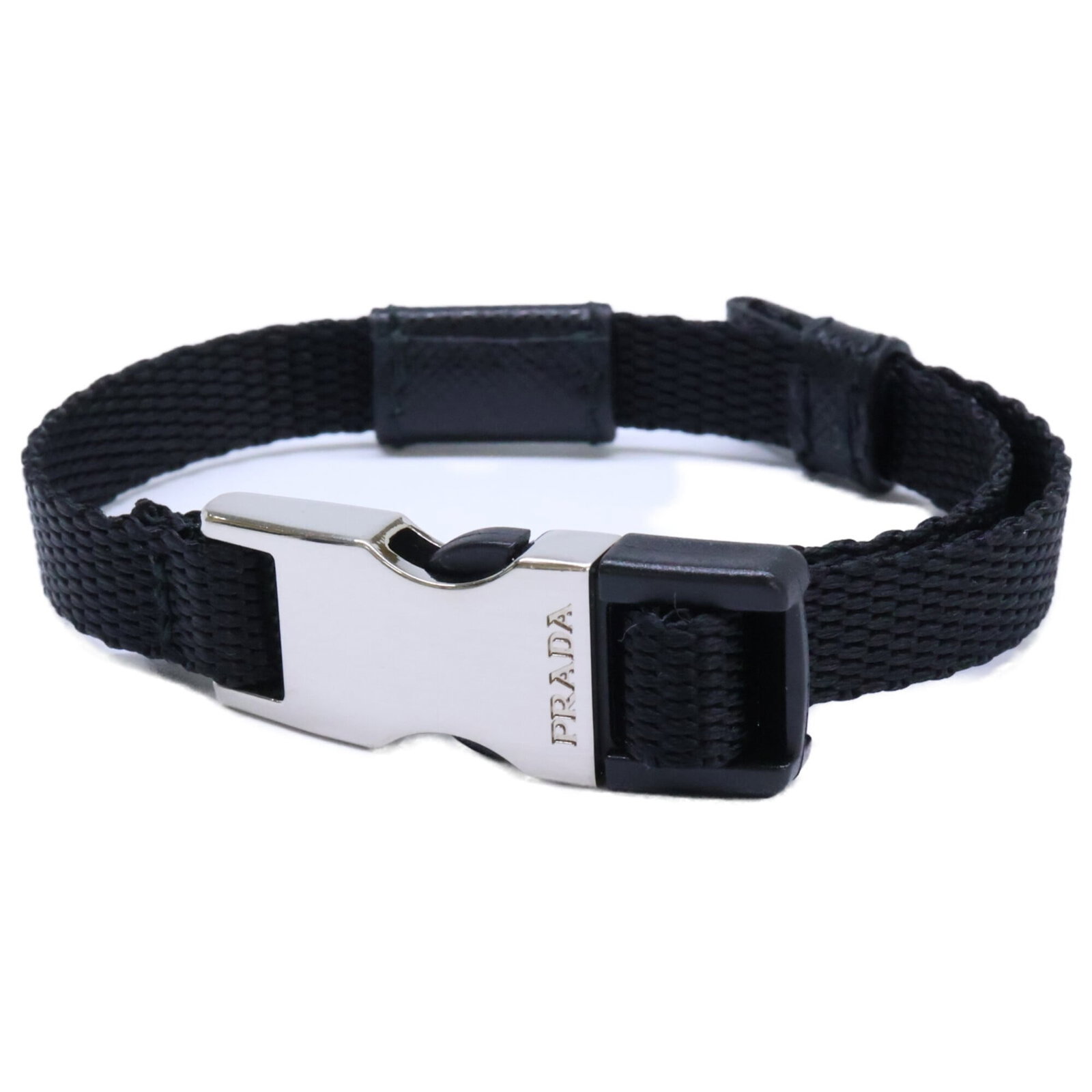 PRADA Charm Bracelet Nylon: PRADA Charm Bracelet Nylon Black Prada nylon charm bracelet with a 27cm length, bearing minor signs of wear and small scratches or light marks. Gently used in very good condition. Item Specifics: