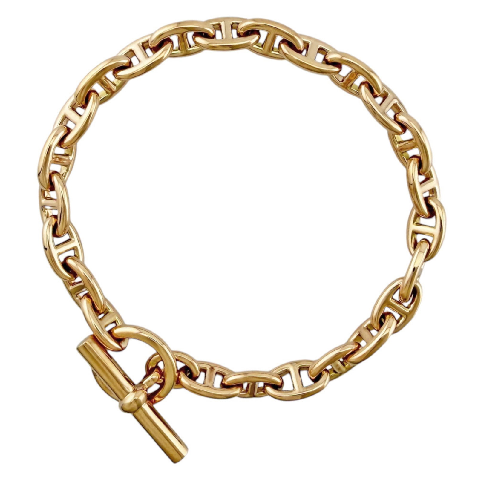 HERMES Charm Bracelet Pink Gold (18K): HERMES Charm Bracelet Pink Gold (18K) Pink gold (18K) charm bracelet from Hermes, featuring a delicate 5.5mm width and 17cm length, with a weight of 21.1g. Handmade with exceptional craftsmanship,