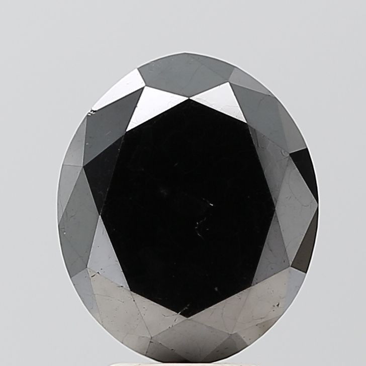 Oval 4.73ct Black VVS2 - Loose Natural Diamond: Oval 4.73ct Black VVS2 - Loose Natural Diamond Oval cut diamond with a rich black color, measuring 4.73 carats and boasting an exceptional VVS2 clarity grade. Its EX polish and symmetry make it a