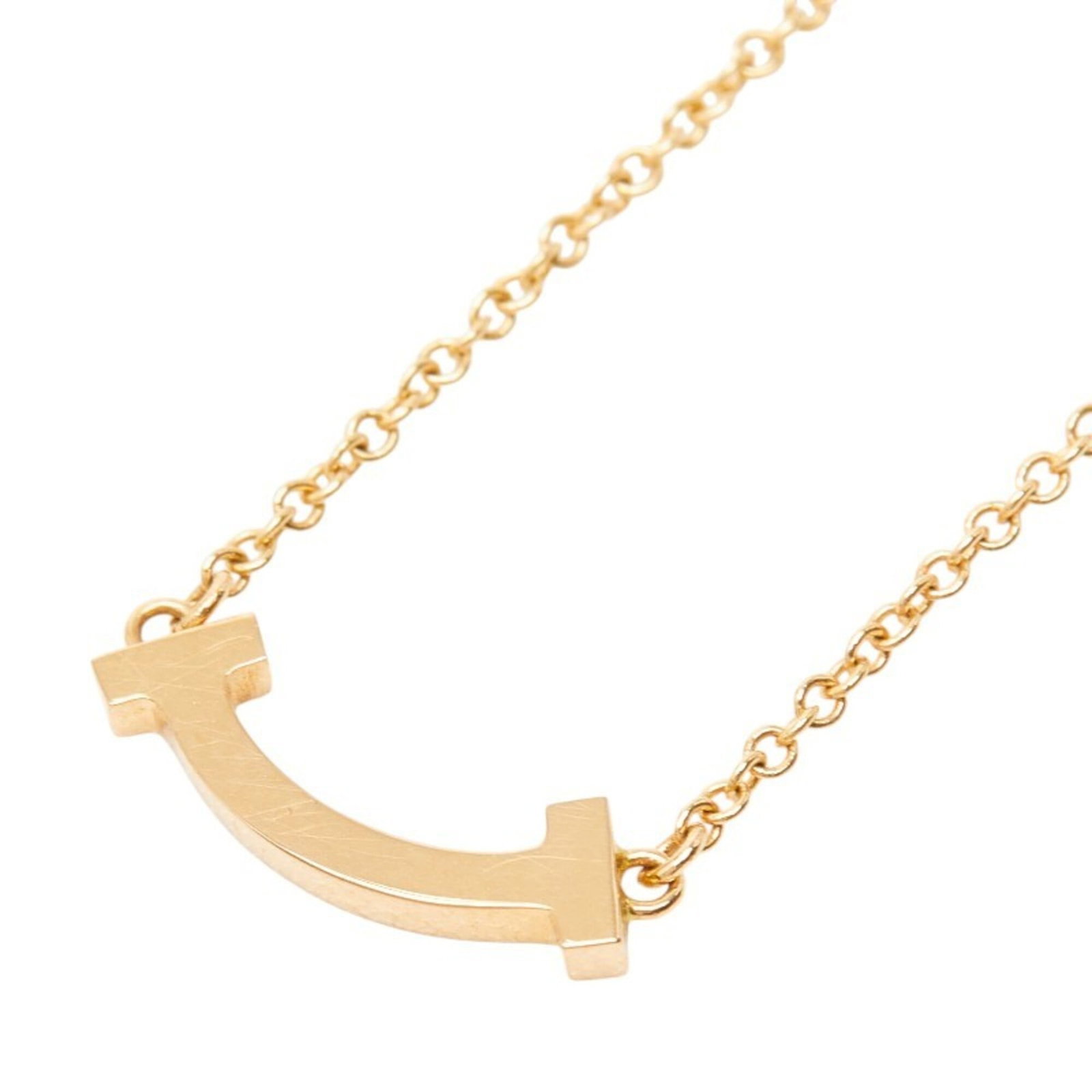 TIFFANY Pink Gold (18K): TIFFANY Pink Gold (18K) Pink gold (18K) necklace with a 4.5mm x 13.4mm pendant, featuring a delicate design in a 45.8 cm / 18.03'' adjustable neck circumference. This gently used Tiffany necklace