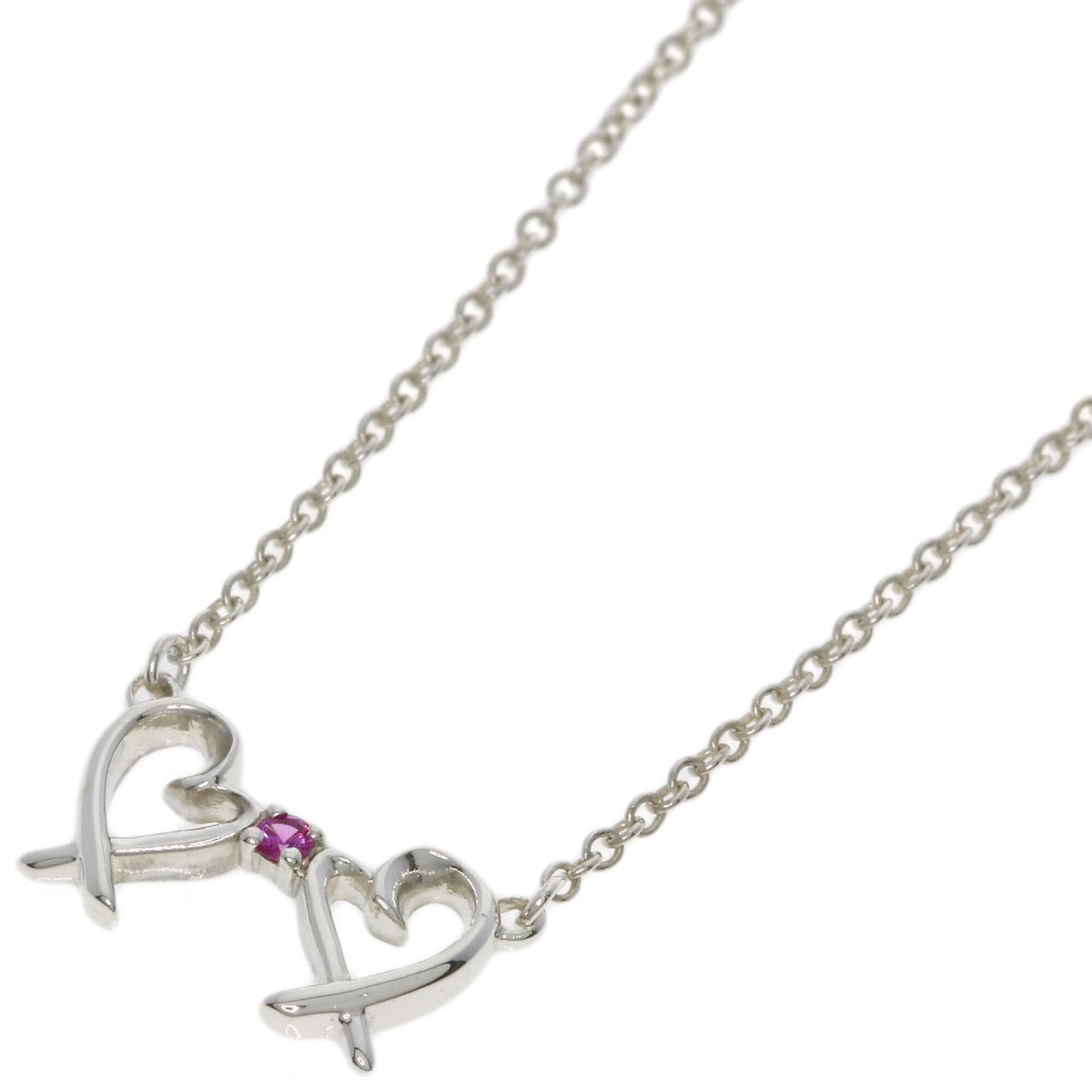 TIFFANY Silver Necklace: TIFFANY Silver Necklace Silver Tiffany Necklace with Sapphire Pendant, 41 cm circumference, featuring a 6.9mm x 11.8mm sapphire stone. Gently used, with minor signs of wear, including small scratches 