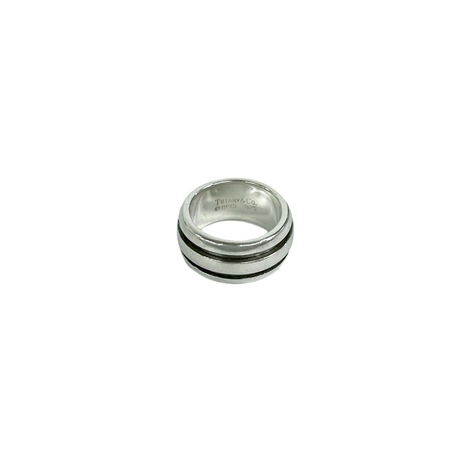 TIFFANY Band Ring Silver 925: TIFFANY Band Ring Silver 925 Silver 925 band ring from Tiffany, a classic design with visible wear and scratches, offering a unique, pre-owned piece. The ring is in good condition, with scuffs and