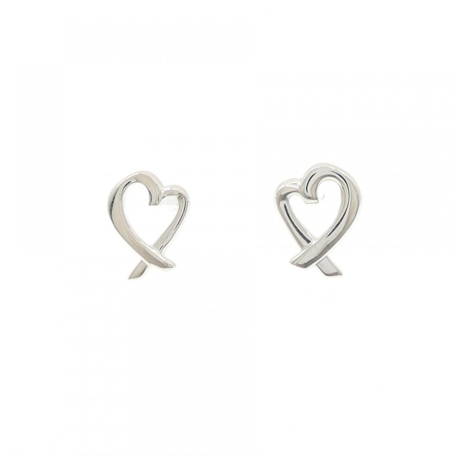 TIFFANY Stud Earrings Silver 925: TIFFANY Stud Earrings Silver 925 Silver 925 stud earrings from Tiffany, bearing a minor signature. These gently used earrings feature a small scratch or light mark, but remain in very good condition.
