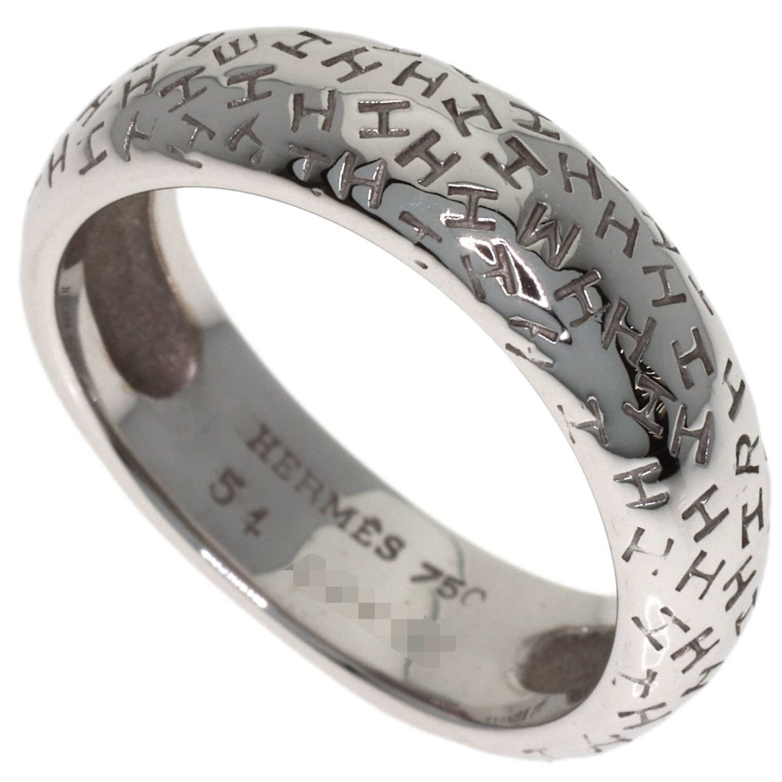 HERMES Band Ring White Gold (18K): HERMES Band Ring White Gold (18K) White gold (18K) band ring from Hermes, featuring a classic design. The ring is in very good condition, with minor signs of wear and small scratches or light marks pr