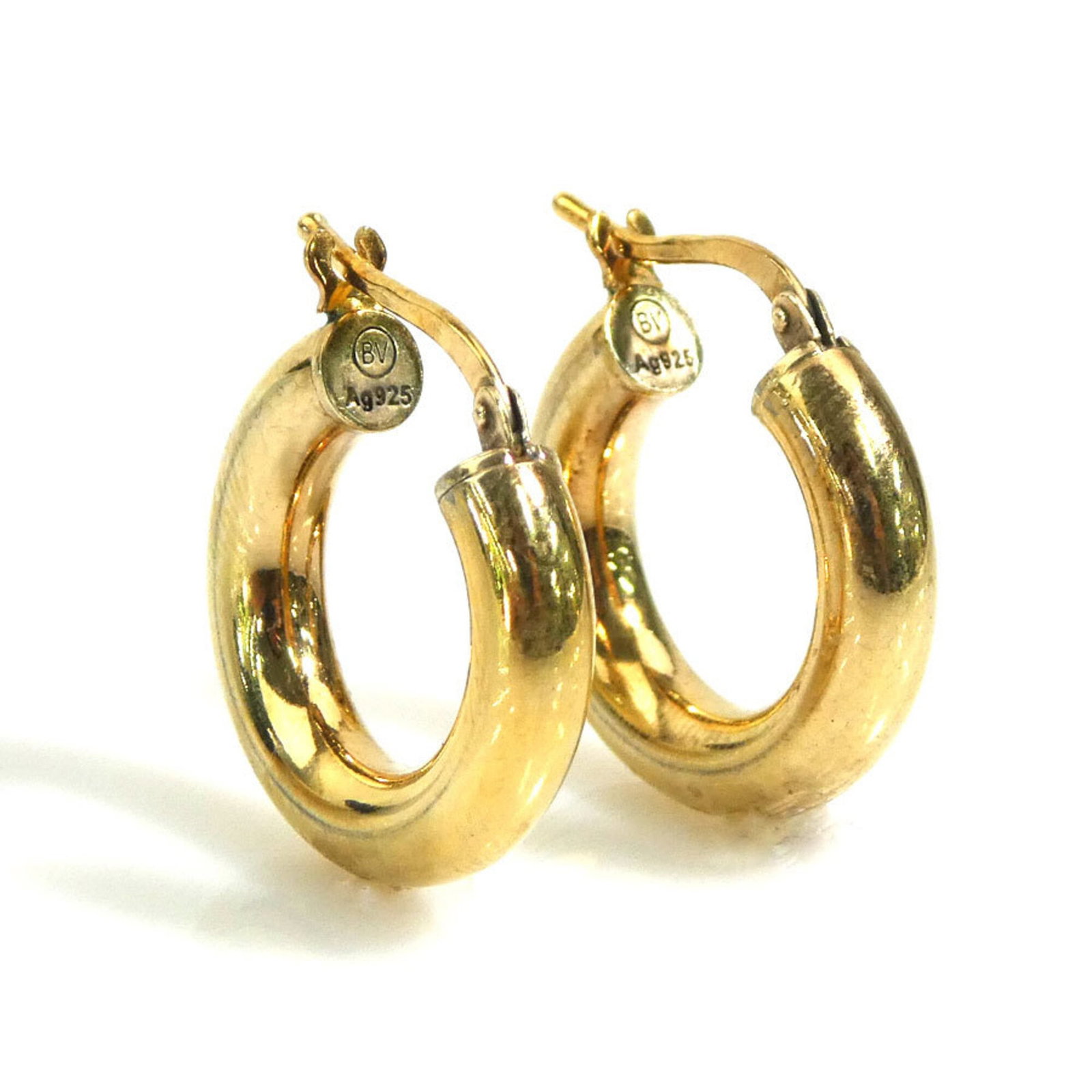 BOTTEGA VENETA Ring Earrings Metal: BOTTEGA VENETA Ring Earrings Metal Gold Bottega Veneta ring earrings with a diameter of 18mm, bearing visible scratches and scuffs, are available for purchase. Made from metal, these earrings showcase