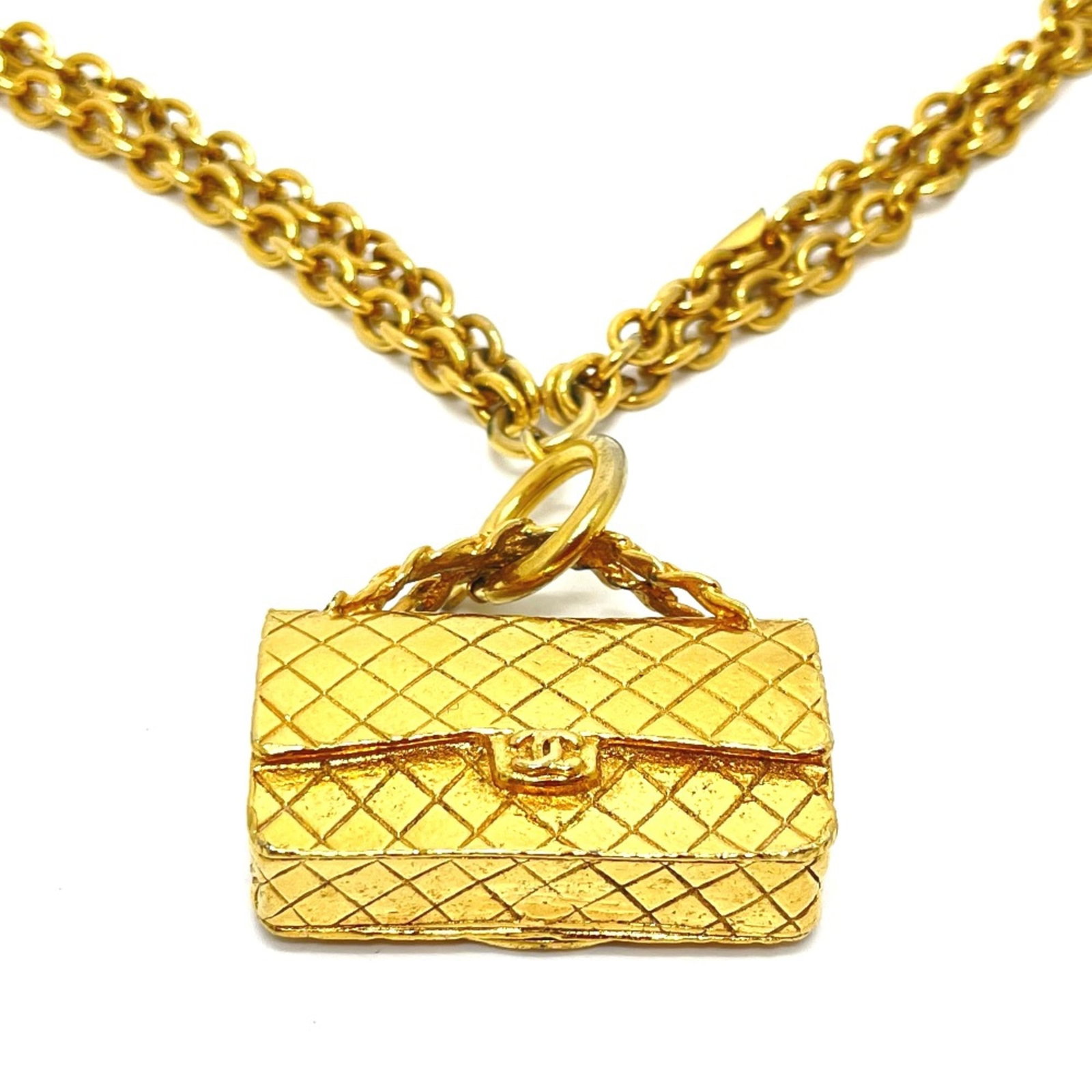 CHANEL Necklace Gold Plated: CHANEL Necklace Gold Plated Gold plated CHANEL Necklace with visible wear, scratches, and scuffs, offering a unique and worn-in look. Total length is 17.6 inches. Item Specifics: Brand: Chanel Type: N