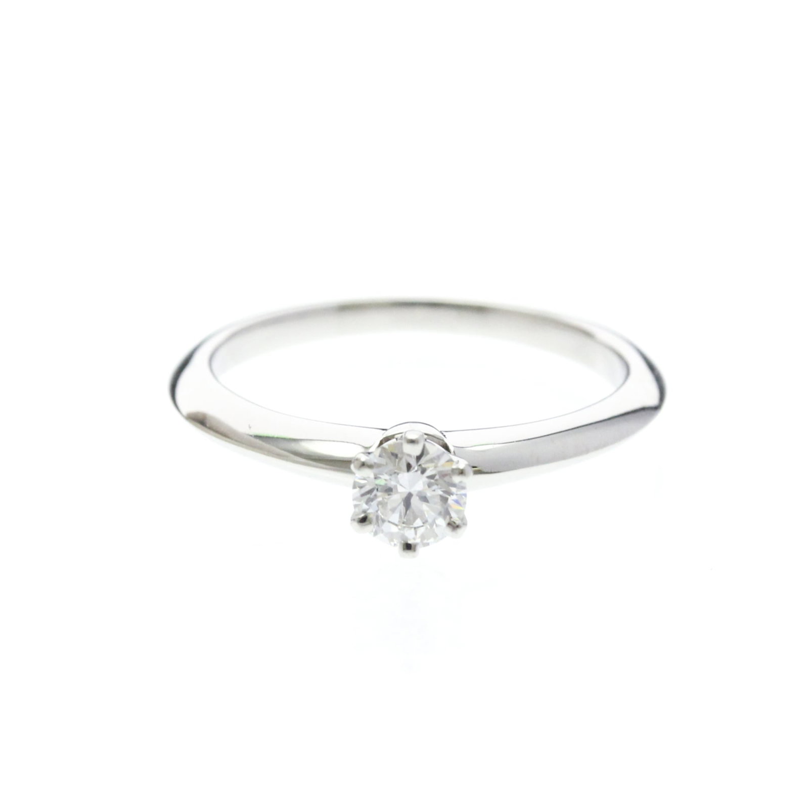 TIFFANY Band Ring Platinum: TIFFANY Band Ring Platinum Platinum band ring featuring a 0.29ct diamond, available in a silver Tiffany model with a 4.80mm x 4.80mm stone size, in a size range of 5-5.5. Item Specifics: Brand: Tiffan