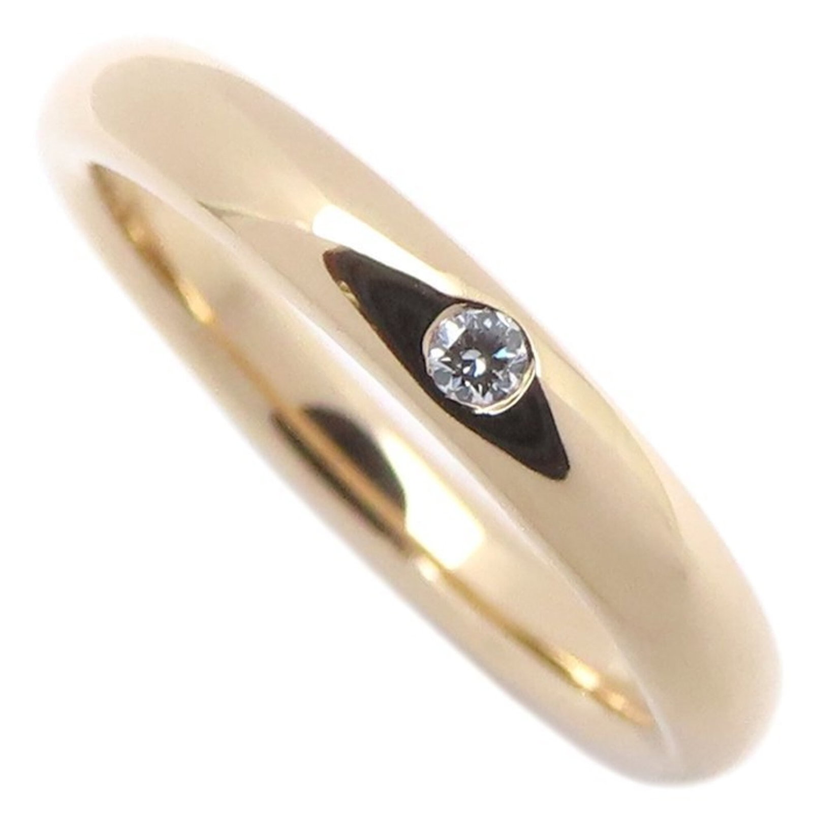 TIFFANY Band Ring Rose Gold (18K): TIFFANY Band Ring Rose Gold (18K) Stacked with elegance, this Tiffany band ring in rose gold features a delicate 2.7mm diamond set into a slender 18K band, available in a US size 4. Item Specifics: