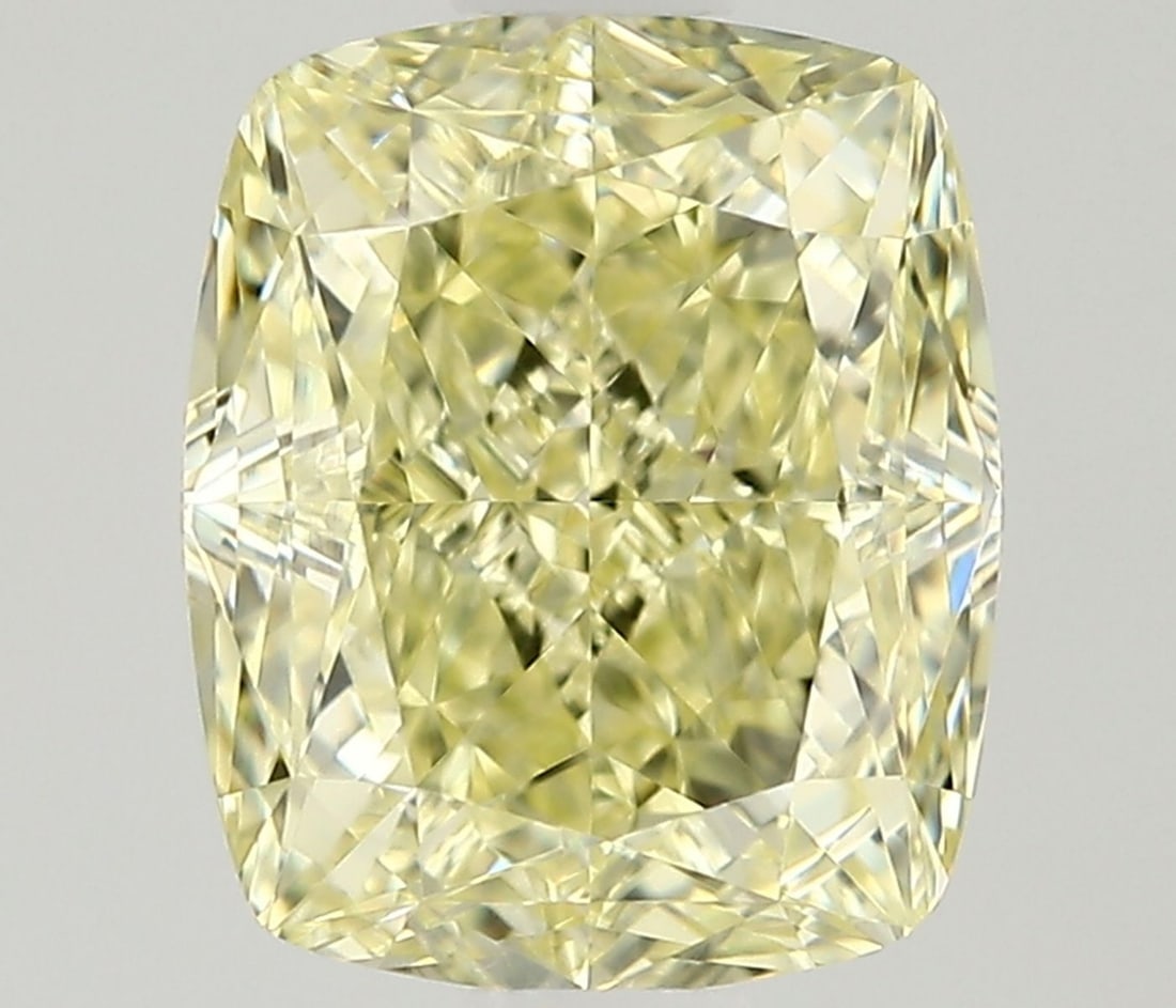 GIA Cushion Modified 1.23ct Fancy Light Yellow VVS2 - Loose Natural Diamond: GIA Cushion Modified 1.23ct Fancy Light Yellow VVS2 - Loose Natural Diamond GIA certified, this 1.23ct Fancy Light Yellow VVS2 diamond boasts exceptional clarity and a vibrant, sunny hue. Measuring 6.