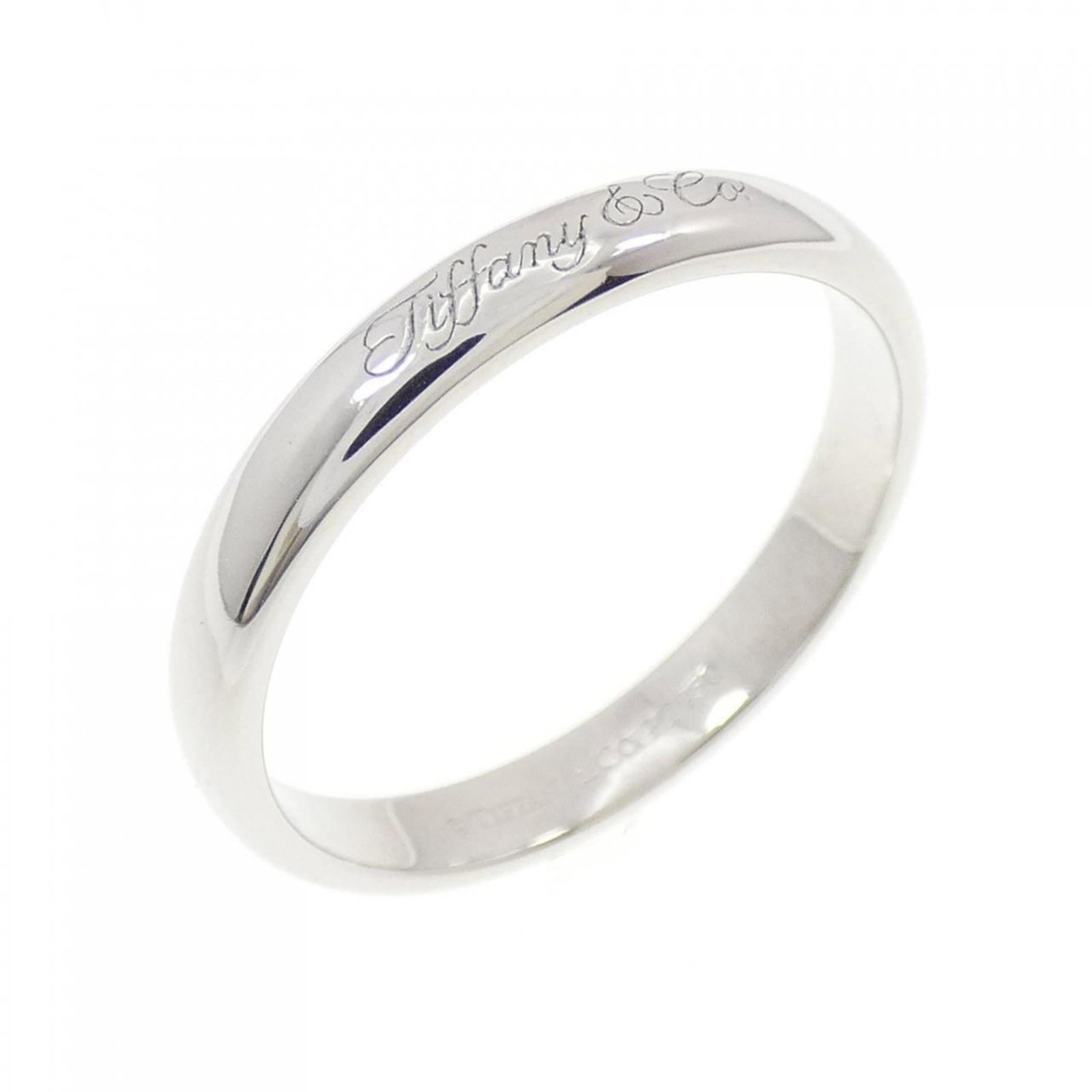 TIFFANY Band Ring: TIFFANY Band Ring Platinum band ring from Tiffany, featuring a 950 platinum metal construction with a US size 7.5 and 2.9mm width. Gently used with minor signs of wear, this ring is in very good condi