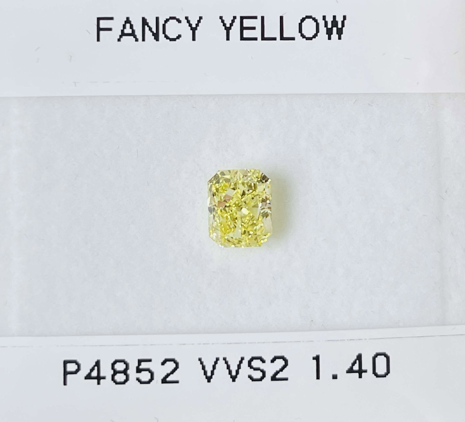 GIA Radiant 1.4ct Fancy Yellow VVS2 - Loose Natural Diamond: GIA Radiant 1.4ct Fancy Yellow VVS2 - Loose Natural Diamond GIA-certified, this 1.4ct Fancy Yellow VVS2 diamond boasts exceptional clarity and a vibrant, sunny hue. Its high-quality cut and polish