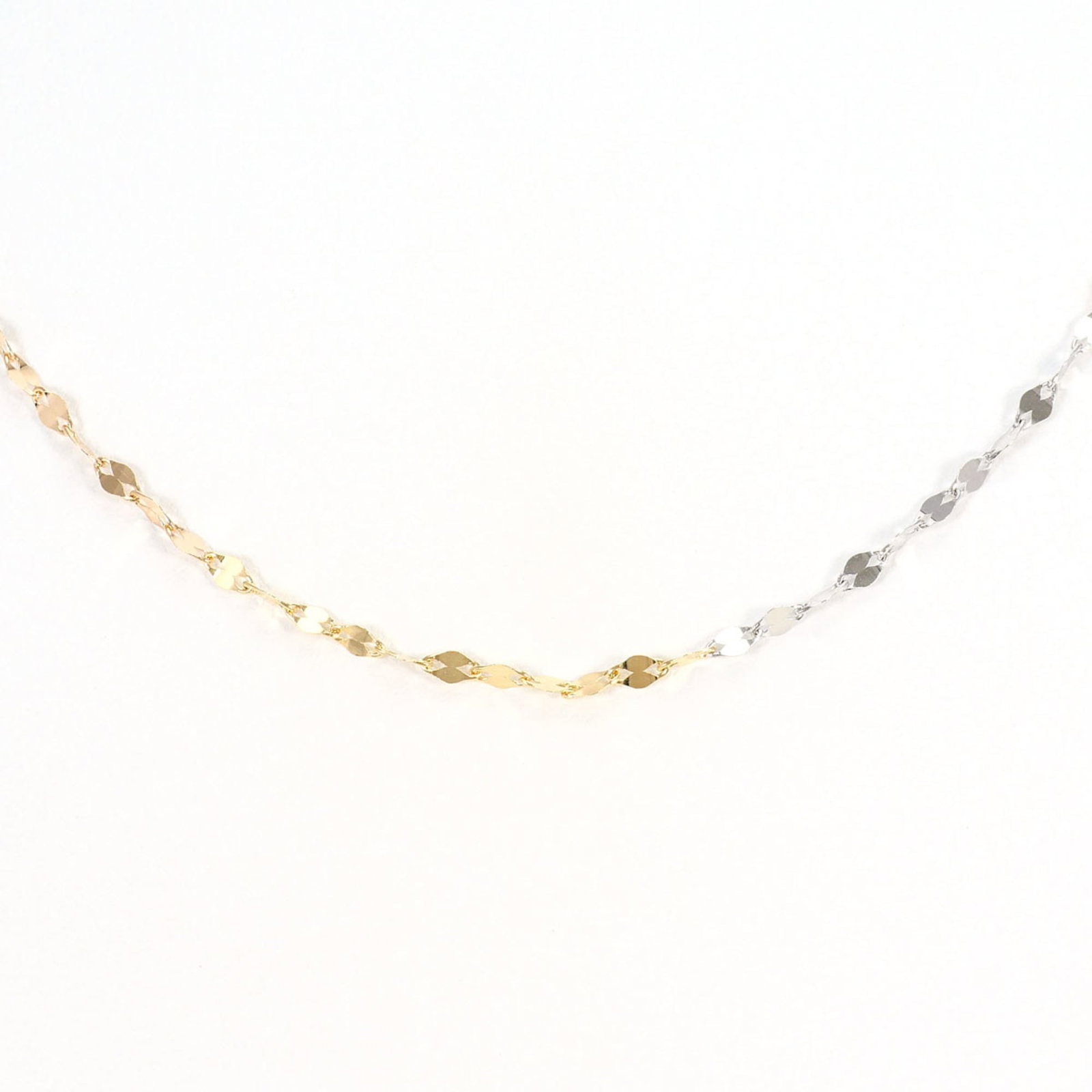 Pink Gold (18K) White Gold (18K) Yellow Gold (18K): Pink Gold (18K) White Gold (18K) Yellow Gold (18K) Pink gold, white gold, and yellow gold come together in this 18K triple metal necklace, showcasing a unique blend of colors. The necklace features a