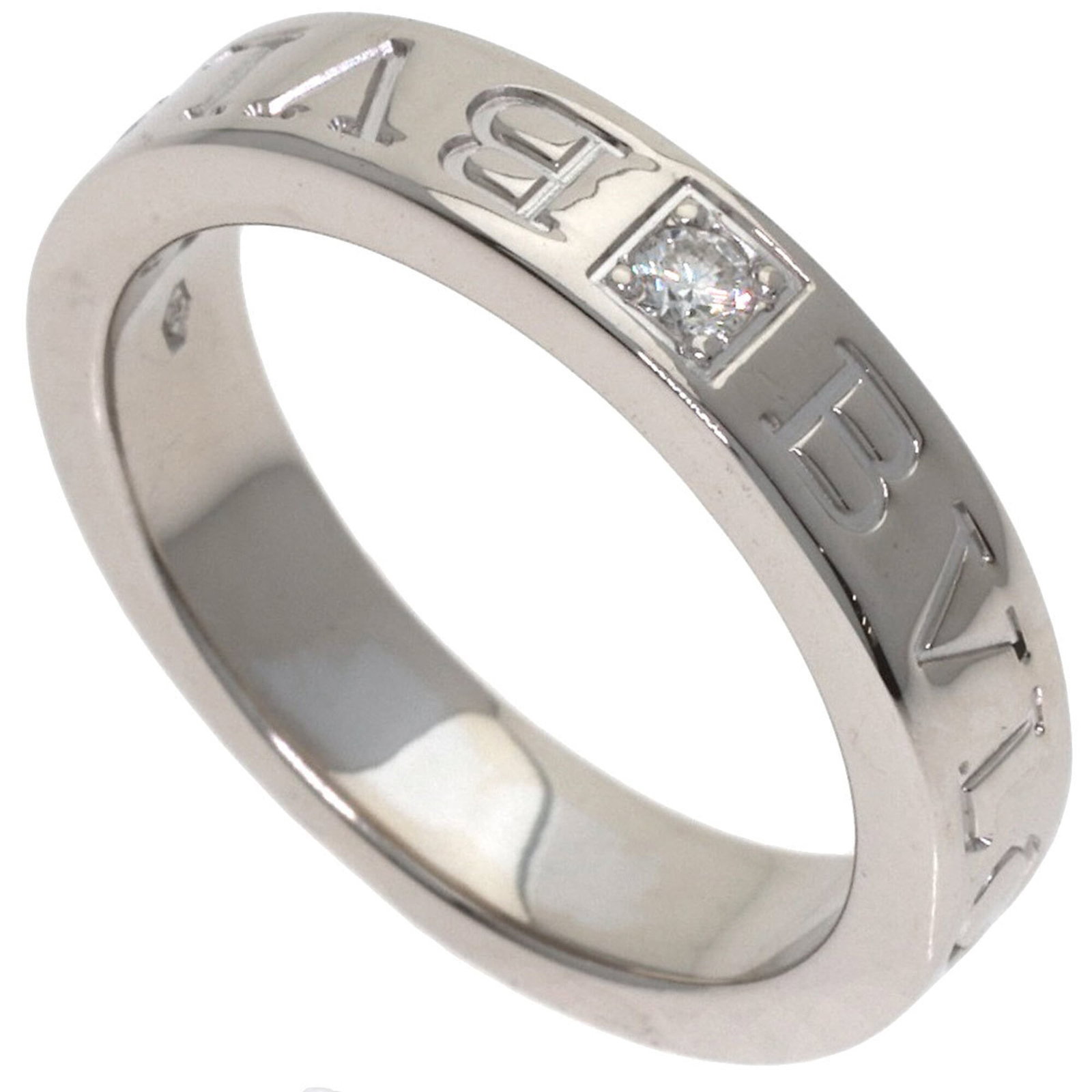 BVLGARI Band Ring White Gold (18K): BVLGARI Band Ring White Gold (18K) Bvlgari Band Ring White Gold (18K) is a gently used, 18K white gold band ring featuring a diamond stone. The ring showcases minor signs of wear, including small scra