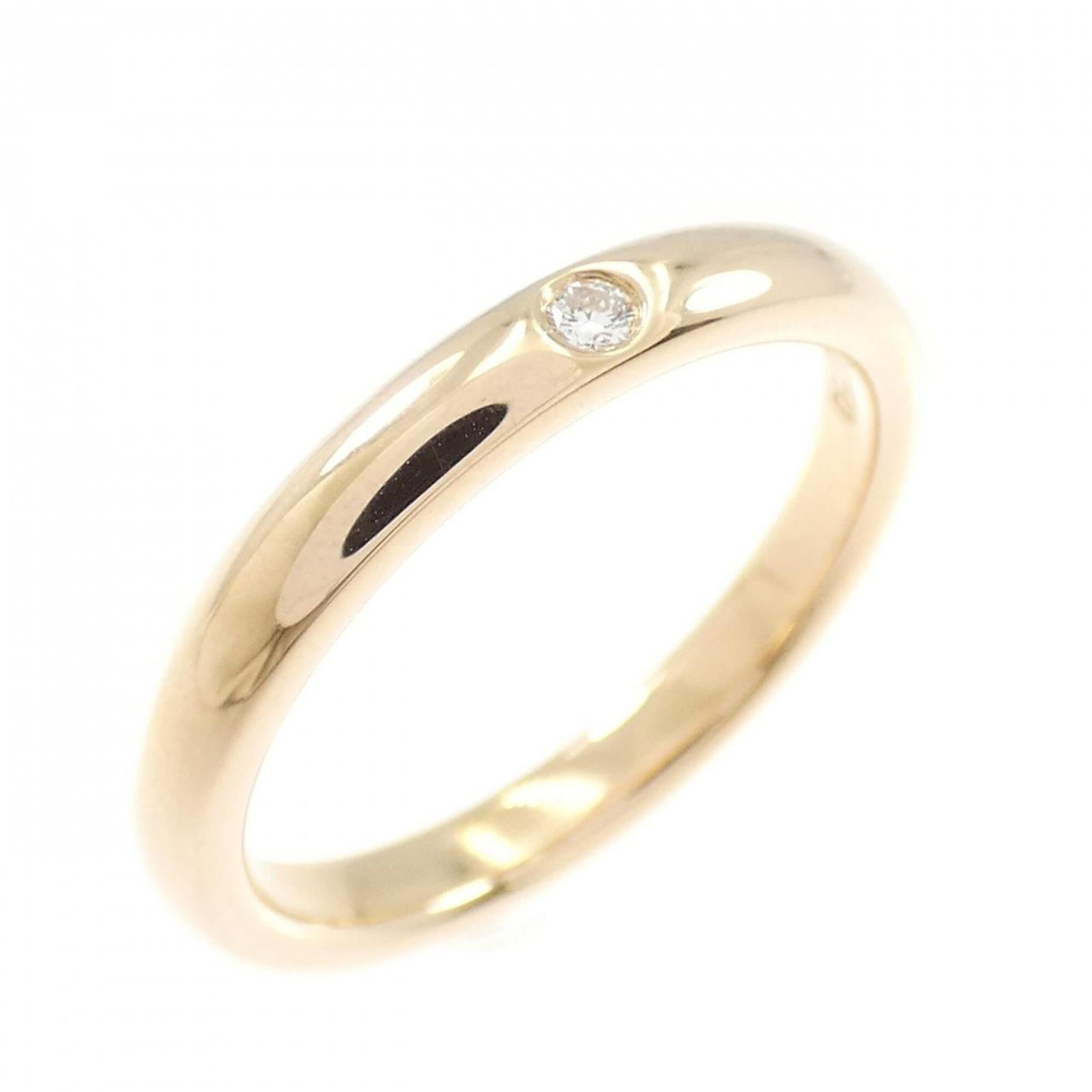 TIFFANY Band Ring Pink Gold (18K): TIFFANY Band Ring Pink Gold (18K) Pink gold (18K) band ring from Tiffany, featuring a diamond stone and a classic design. Gently used with minor signs of wear, this ring is in very good condition. The