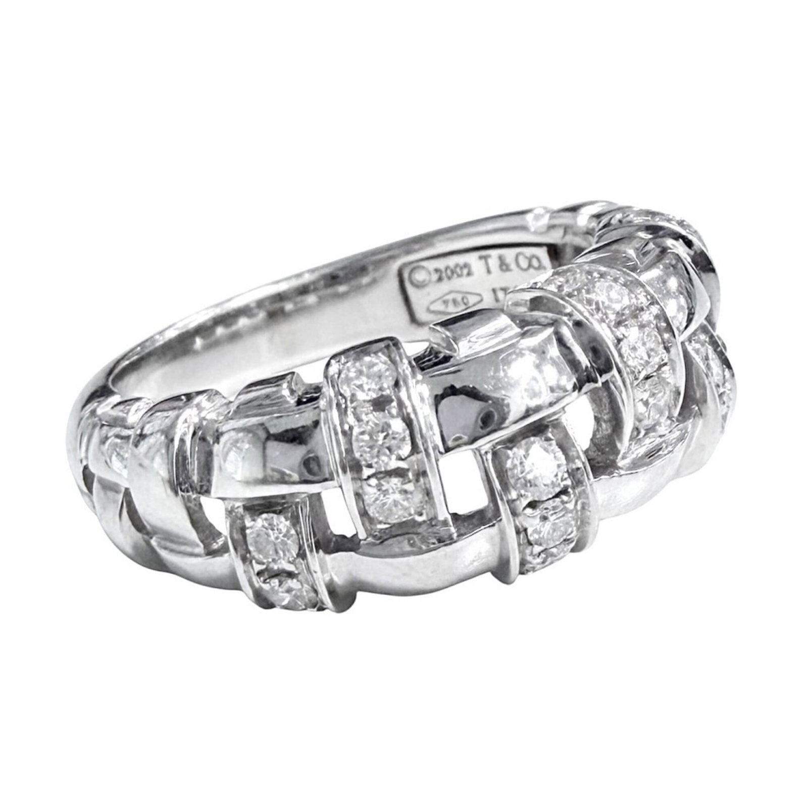 TIFFANY Band Ring White Gold (18K): TIFFANY Band Ring White Gold (18K) White gold band ring from Tiffany featuring a diamond stone, available in US size 6.5. The ring showcases a 7mm wide band with a 12mm inner diameter, weighing 6.6g. 