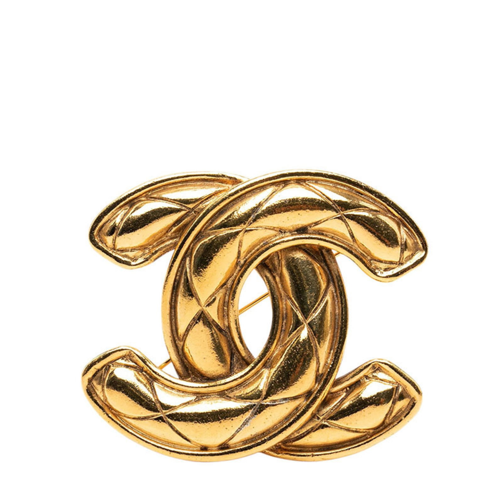 CHANEL Brooch Gold: CHANEL Brooch Gold Gold brooch from the iconic CHANEL brand, featuring a delicate design with minor signs of wear. The brooch measures 4.93cm x 5.72cm and is in very good condition, gently used with