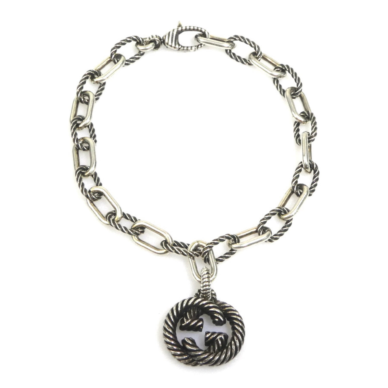 GUCCI Charm Bracelet Silver 925: GUCCI Charm Bracelet Silver 925 Silver 925 charm bracelet from Gucci, featuring a sleek and sophisticated design. This 18.5cm long charm bracelet is made from high-quality silver and showcases a
