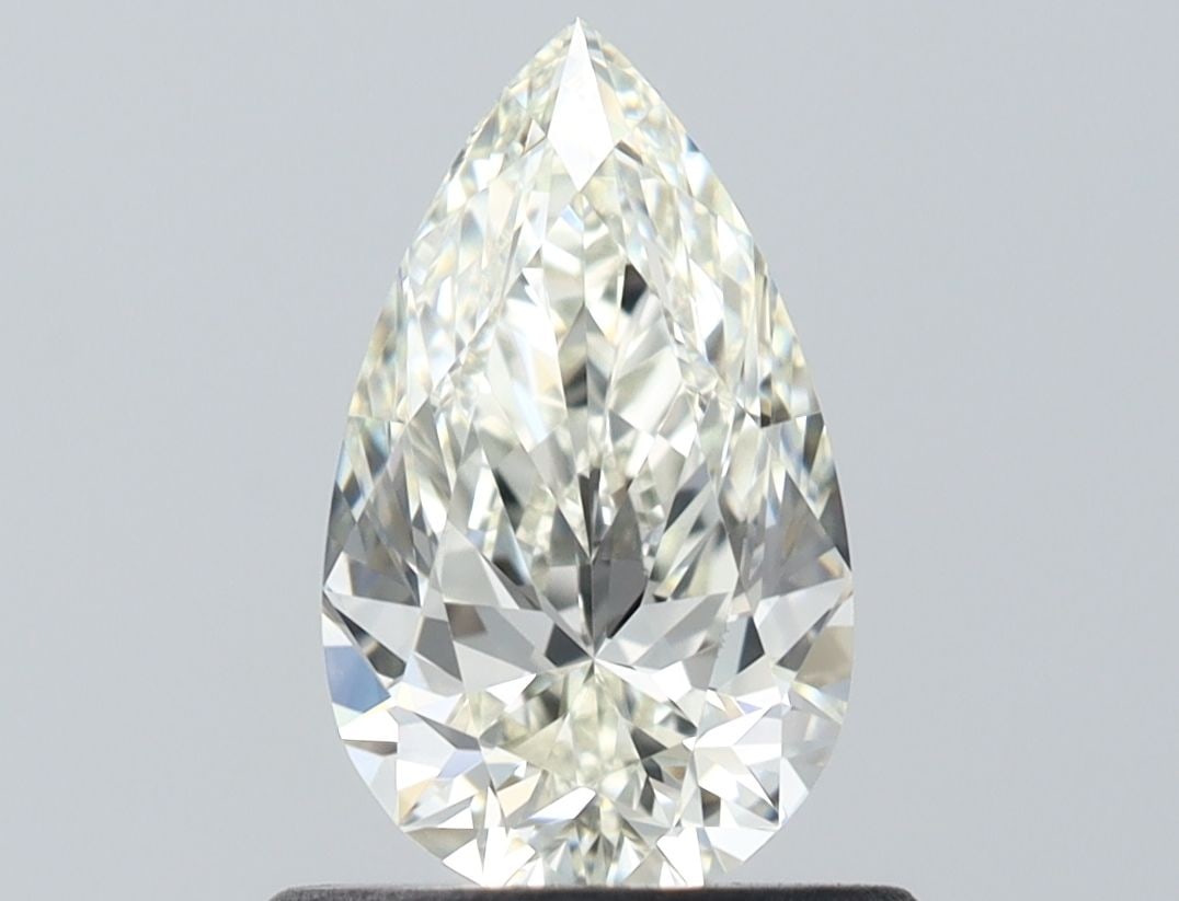 IGI Pear 0.7ct J VVS1 - Loose Natural Diamond: IGI Pear 0.7ct J VVS1 - Loose Natural Diamond IGI-certified 0.7ct pear-shaped diamond with excellent VVS1 clarity and EX polish, boasting a J color grade and exceptional symmetry. This loose natural