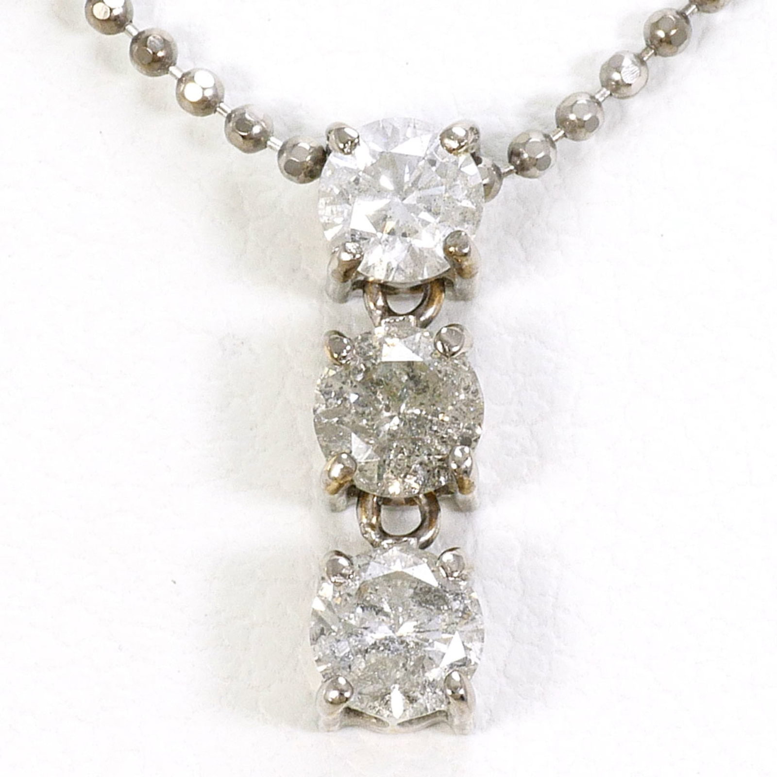 White Gold (18K): White Gold (18K) White gold (18K) necklace with a 0.50ct diamond pendant, featuring a 12mm x 4mm pendant size and a 45cm neck circumference, crafted from 18K white gold metal. This necklace is in
