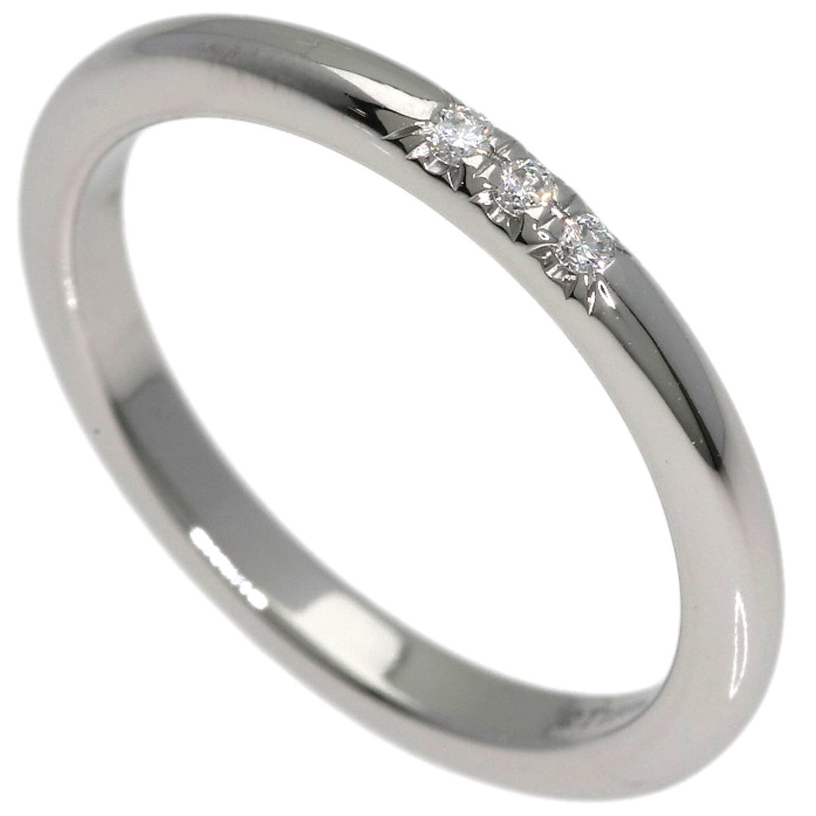 TIFFANY Band Ring Platinum 950: TIFFANY Band Ring Platinum 950 Platinum 950 Tiffany Band Ring with Diamond Stone. Gently used, this band ring features a diamond stone set in platinum, with a US size 4 fit. Minor signs of wear are