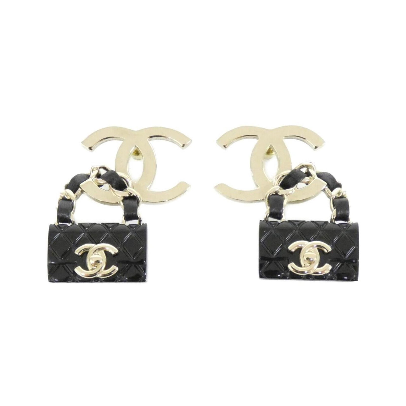 CHANEL Drop Earrings Leather: CHANEL Drop Earrings Leather Drop earrings in black calfskin leather, bearing a signature, are a stylish accessory for women. Made from genuine leather, these earrings feature a classic drop design. G