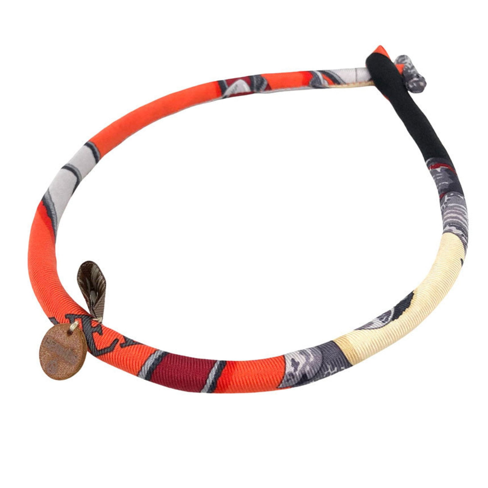 HERMES Silk Orange: HERMES Silk Orange Silk Orange Choker from Hermes boasts a vibrant orange hue, adding a pop of color to any outfit. Made from high-quality silk, this choker is a stylish accessory that can be worn by 