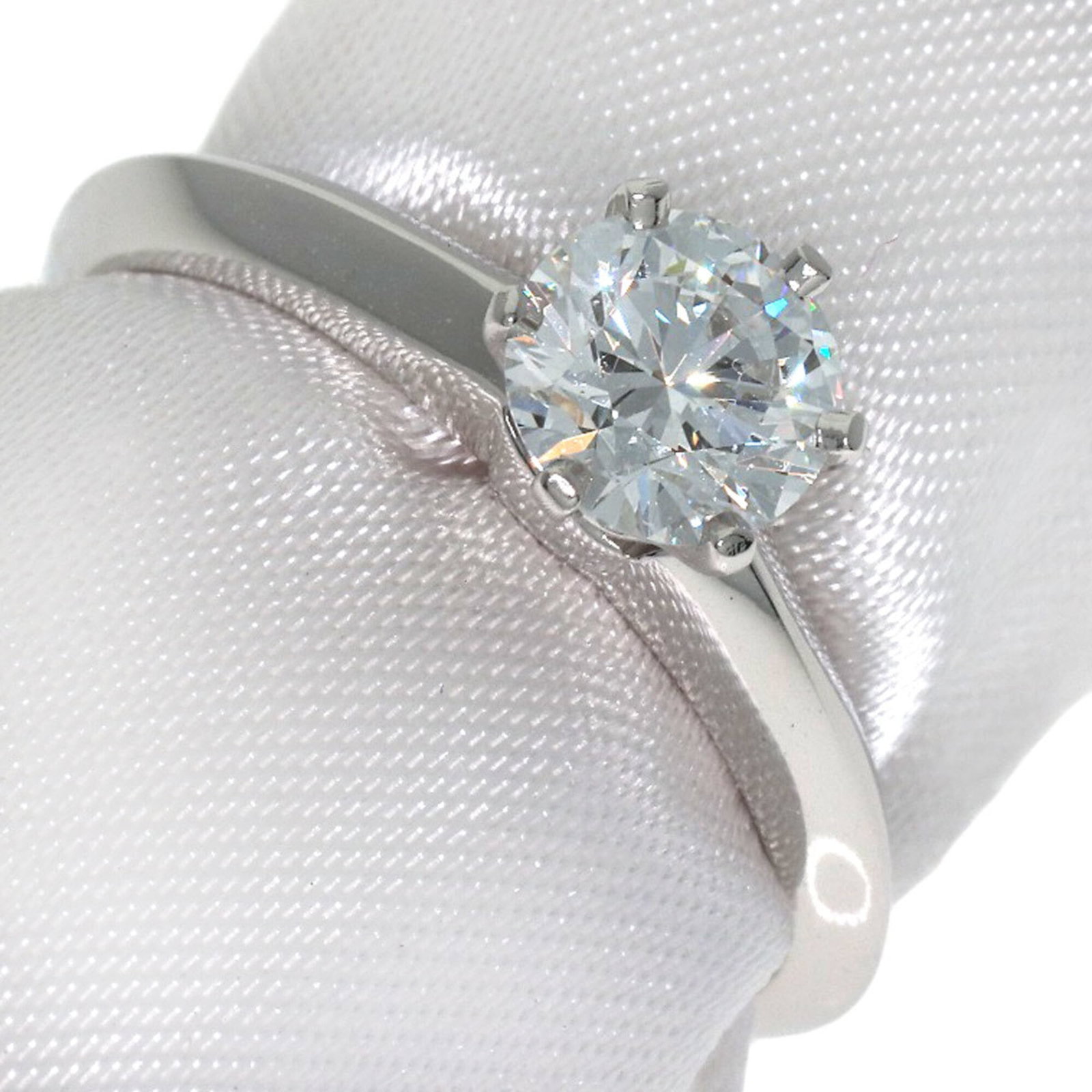 TIFFANY Band Ring Platinum 950: TIFFANY Band Ring Platinum 950 Platinum 950 band ring from Tiffany, featuring a 0.74ct diamond, available in US size 6. Item Specifics: Brand: Tiffany Type: Band ring Gender: Women Material: Platinum