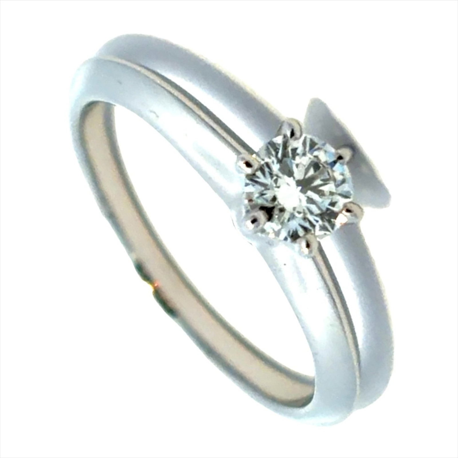 TIFFANY Band Ring Platinum 950: TIFFANY Band Ring Platinum 950 Tiffany & Co.'s iconic band ring is crafted from 950 platinum, featuring a 0.3 carat diamond in VS1 clarity. This Like New used band ring boasts excellent condition with