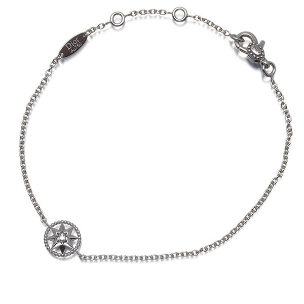 Christian Dior Bracelet Diamond Rose Des Vents 18K 750 White Gold: Christian Dior Bracelet Diamond Rose Des Vents 18K 750 White Gold Christian Dior's 18k white gold Diamond Rose Des Vents bracelet boasts a stunning diamond centerpiece, set against a sleek 7.9mm band.
