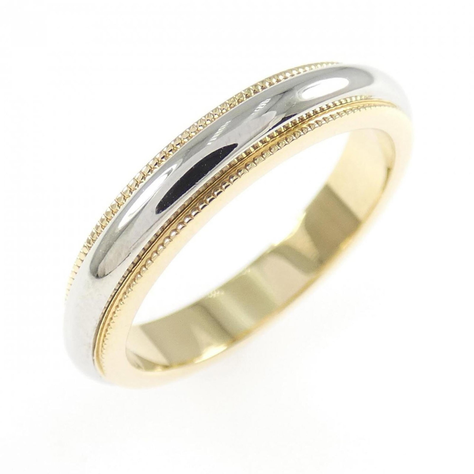 TIFFANY Band Ring Platinum 950 Yellow Gold (18K): TIFFANY Band Ring Platinum 950 Yellow Gold (18K) Platinum 950, Yellow gold (18K) construction provides a durable and luxurious feel. This Tiffany band ring features a classic design with minor scratch