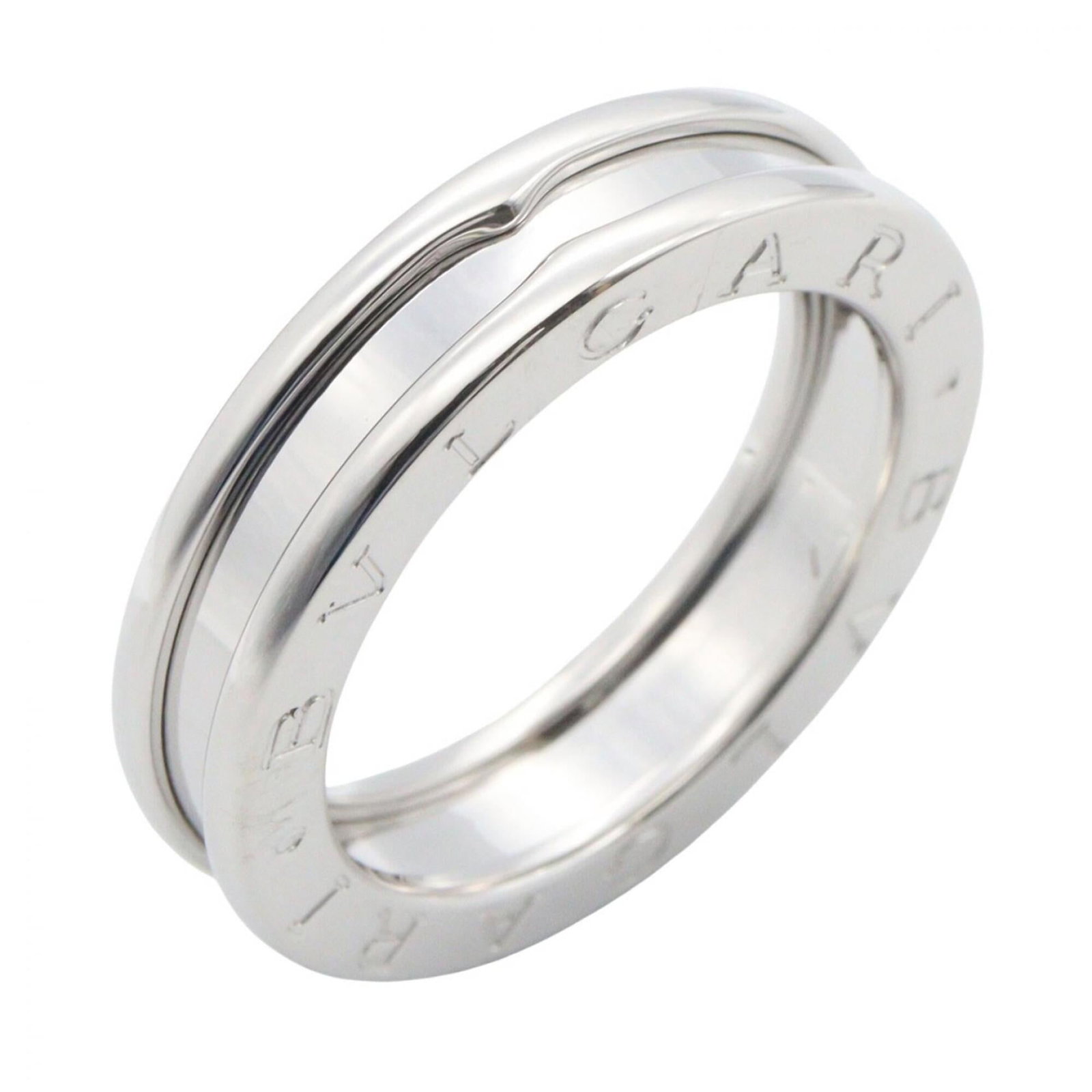 BVLGARI Band Ring White Gold (18K): BVLGARI Band Ring White Gold (18K) Bvlgari Band Ring White Gold (18K) is a sleek and sophisticated silver band ring made from high-quality white gold (18K). Its understated design makes it a
