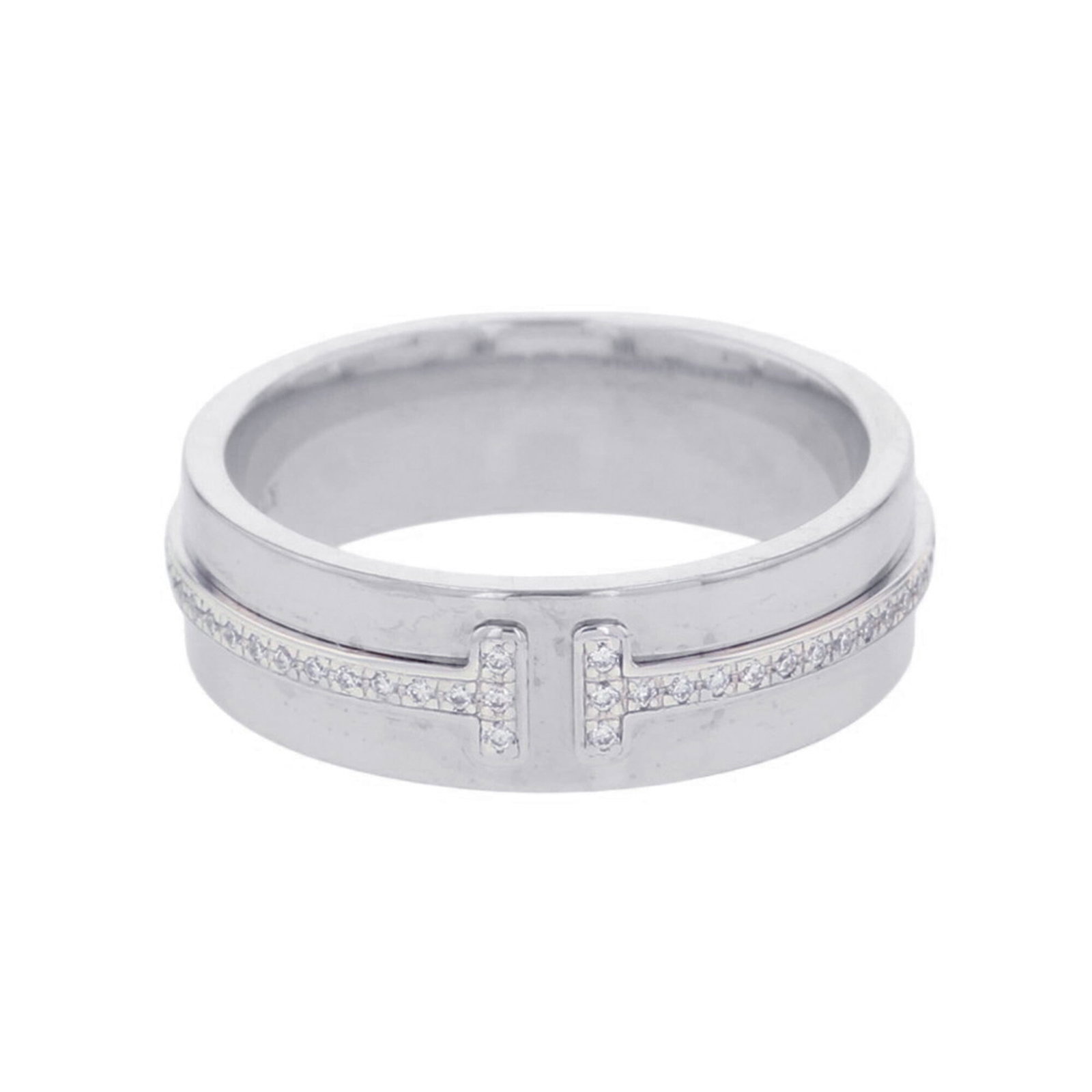 TIFFANY Band Ring White Gold (18K): TIFFANY Band Ring White Gold (18K) 18K white gold band ring from Tiffany, featuring a diamond stone. This like new used ring boasts excellent condition with no visible wear, making it look and