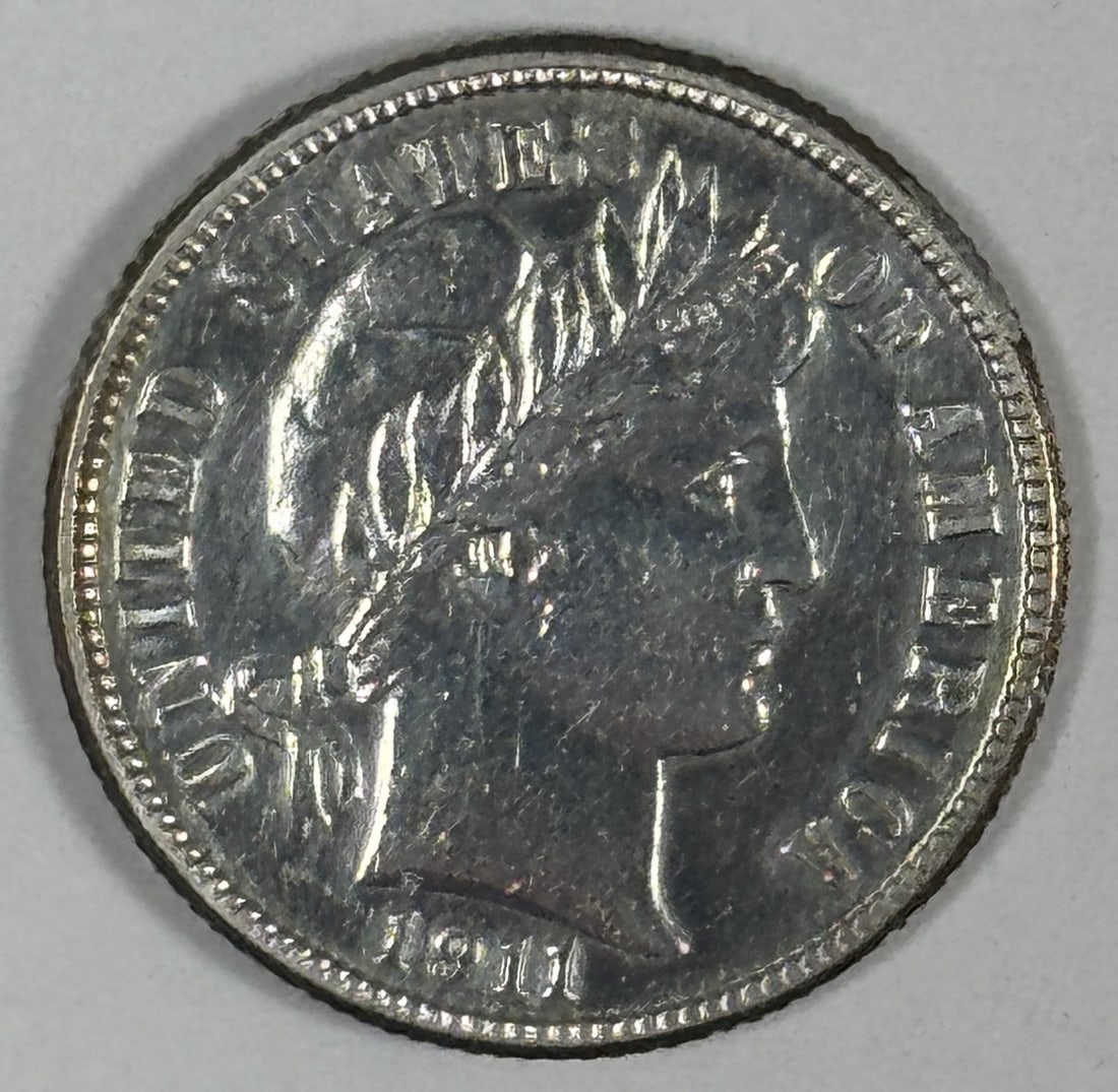 BARBER DIME CHOICE AU 1911-S: BARBER DIME CHOICE AU 1911-S The 1911-S Barber Dime is a circulated example of a silver coin featuring the iconic Barber design. This coin was minted in San Francisco and bears the hallmark of the 191