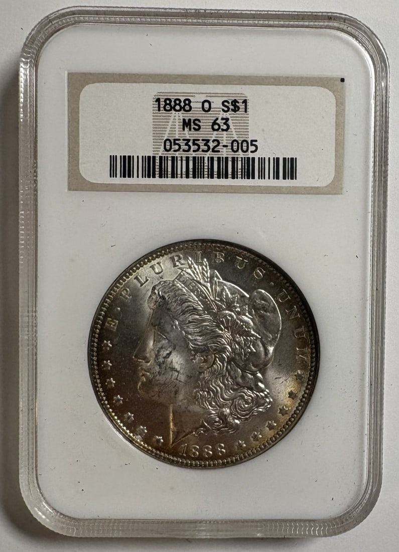 MORGAN DOLLAR 1888 NGC MS63 OLD FATTY: MORGAN DOLLAR 1888 NGC MS63 OLD FATTY Uncirculated Morgan Dollar 1888 with a high-grade MS63 rating, showcasing excellent silver content and a well-preserved condition. This coin was minted in 1888, a